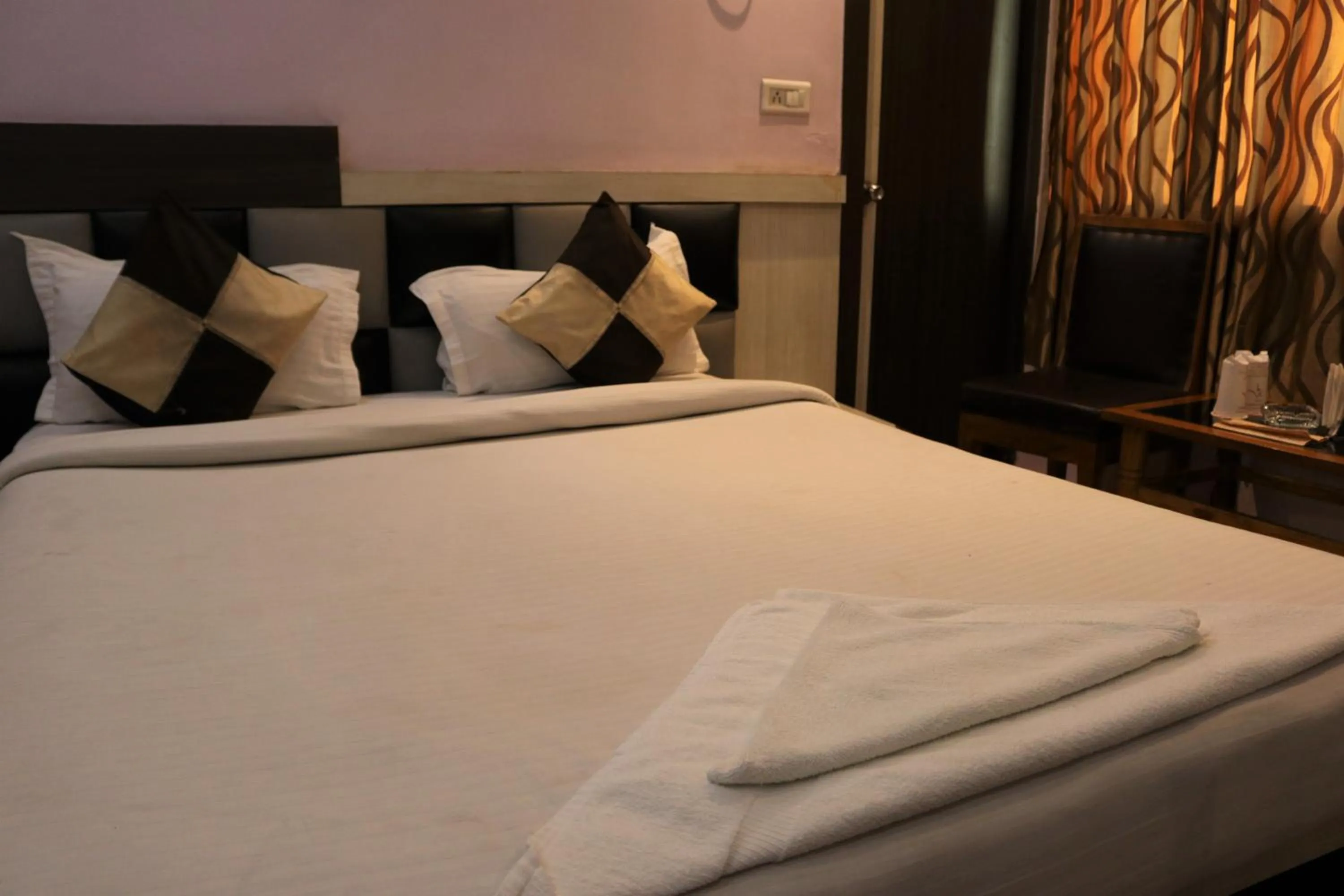 Bed in Hotel Vaishnavi Heights