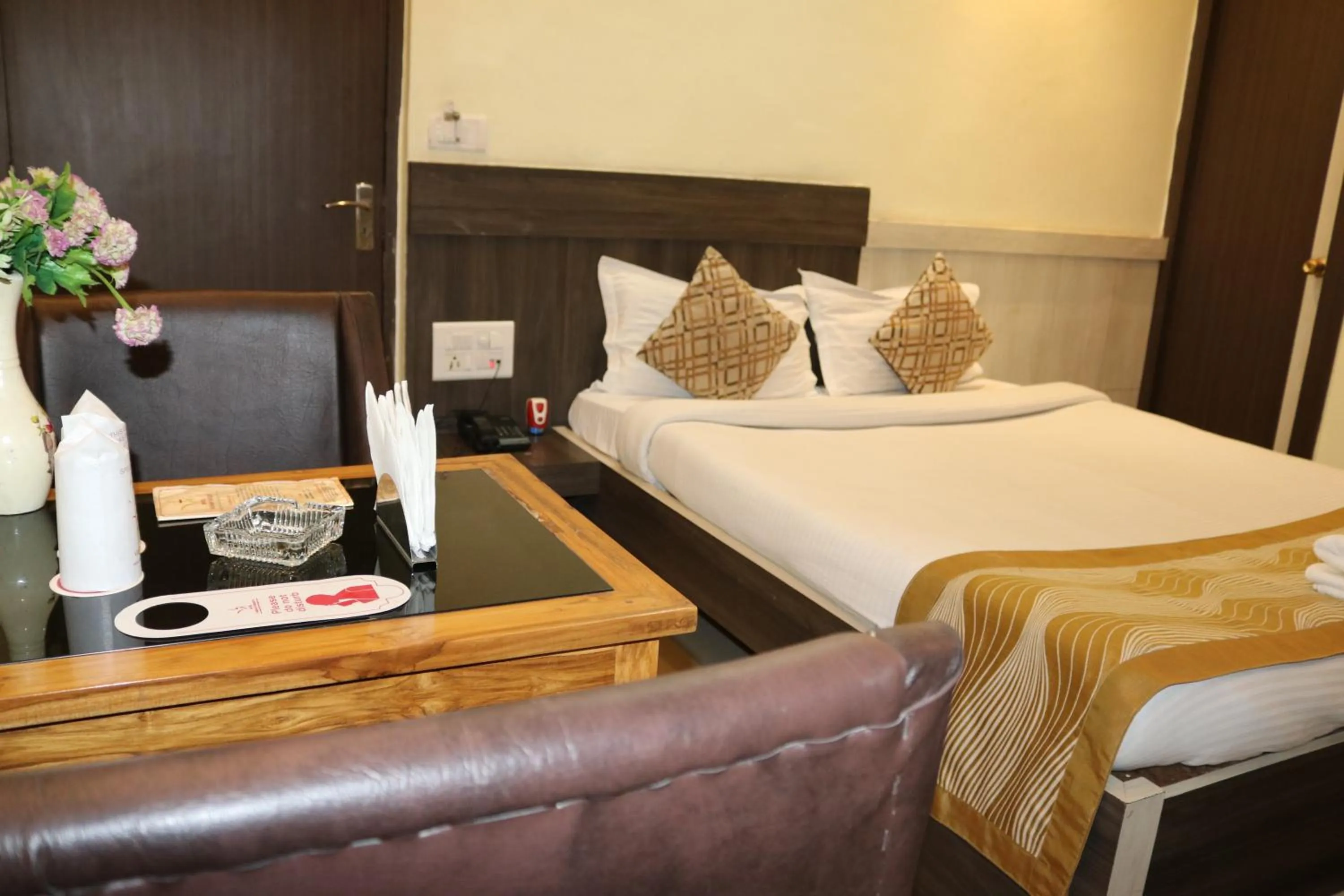Bed in Hotel Vaishnavi Heights
