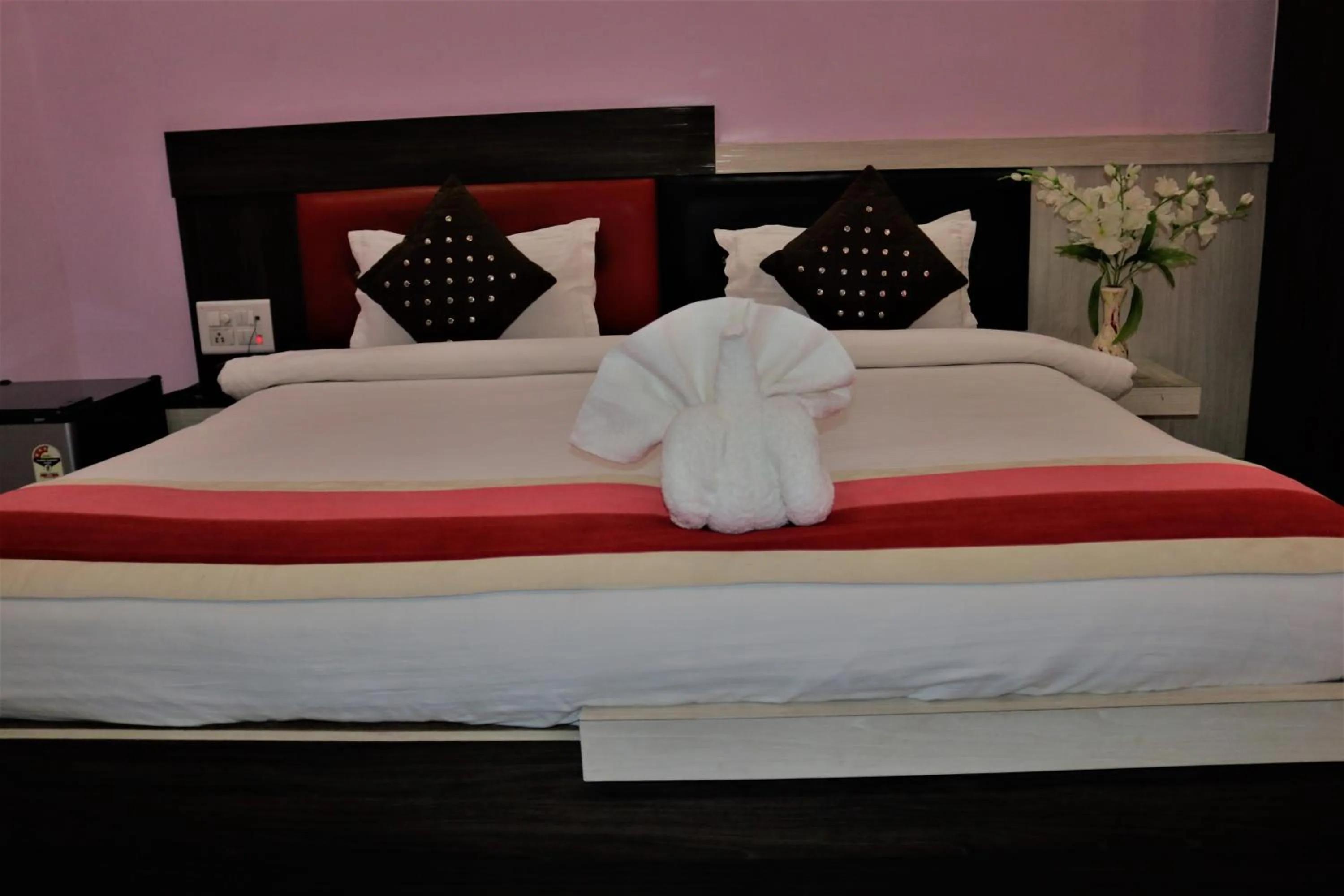 Bed in Hotel Vaishnavi Heights
