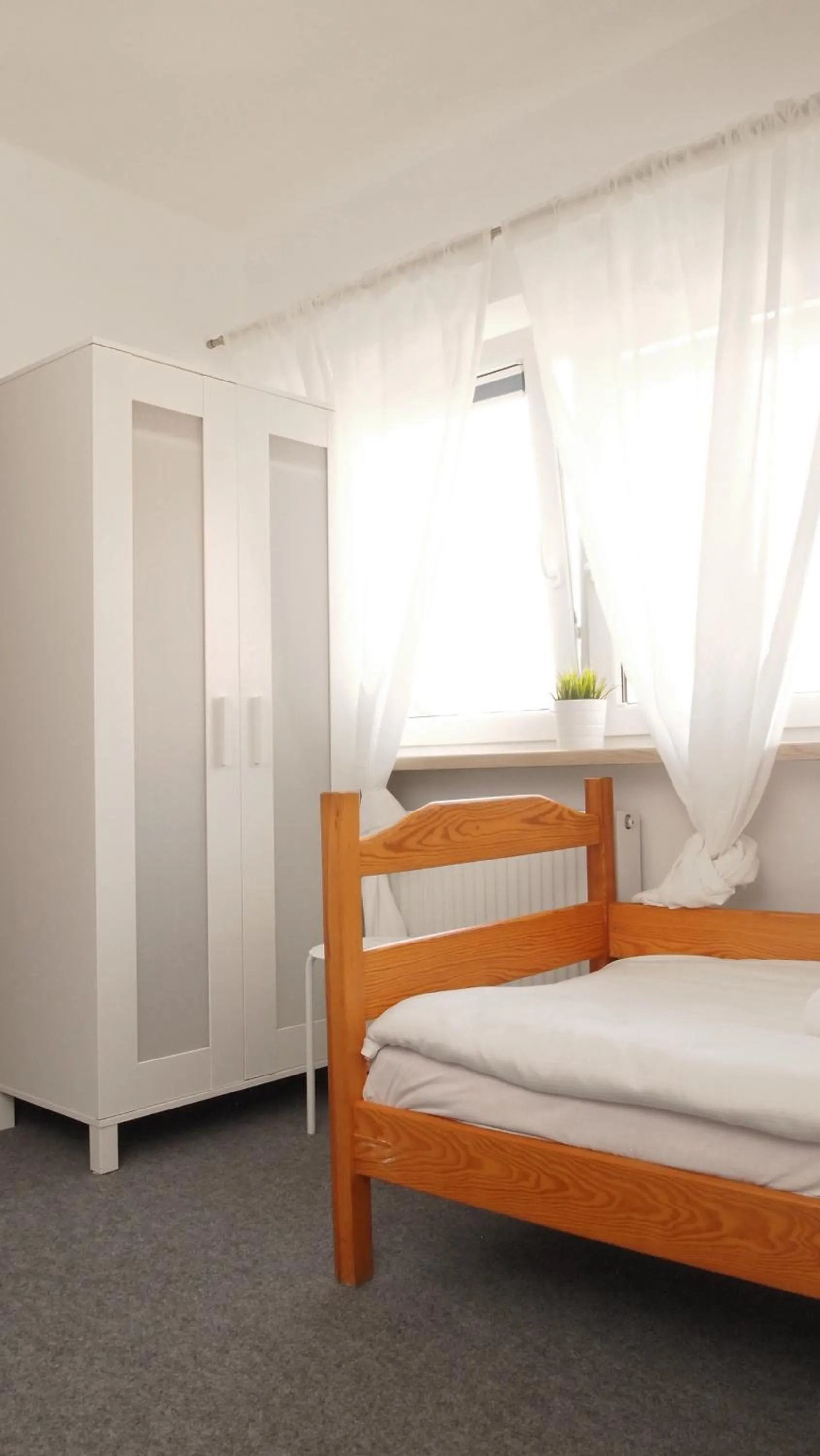 Photo of the whole room, Bed in Dom św. Józefa