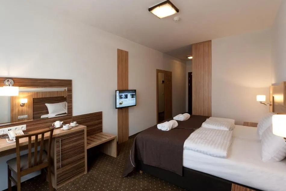 Photo of the whole room, Bed in Hotel Milenium