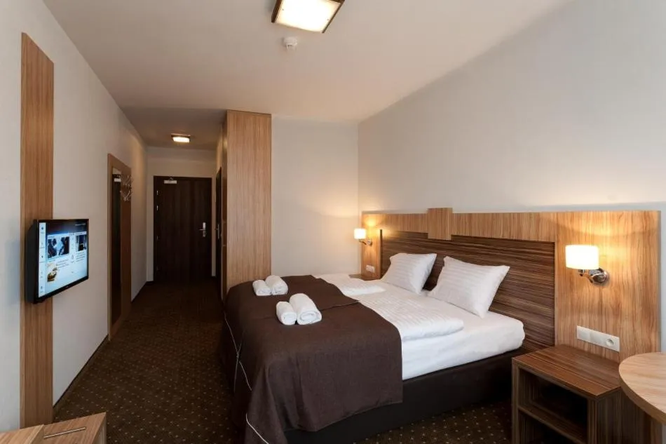 Photo of the whole room, Bed in Hotel Milenium