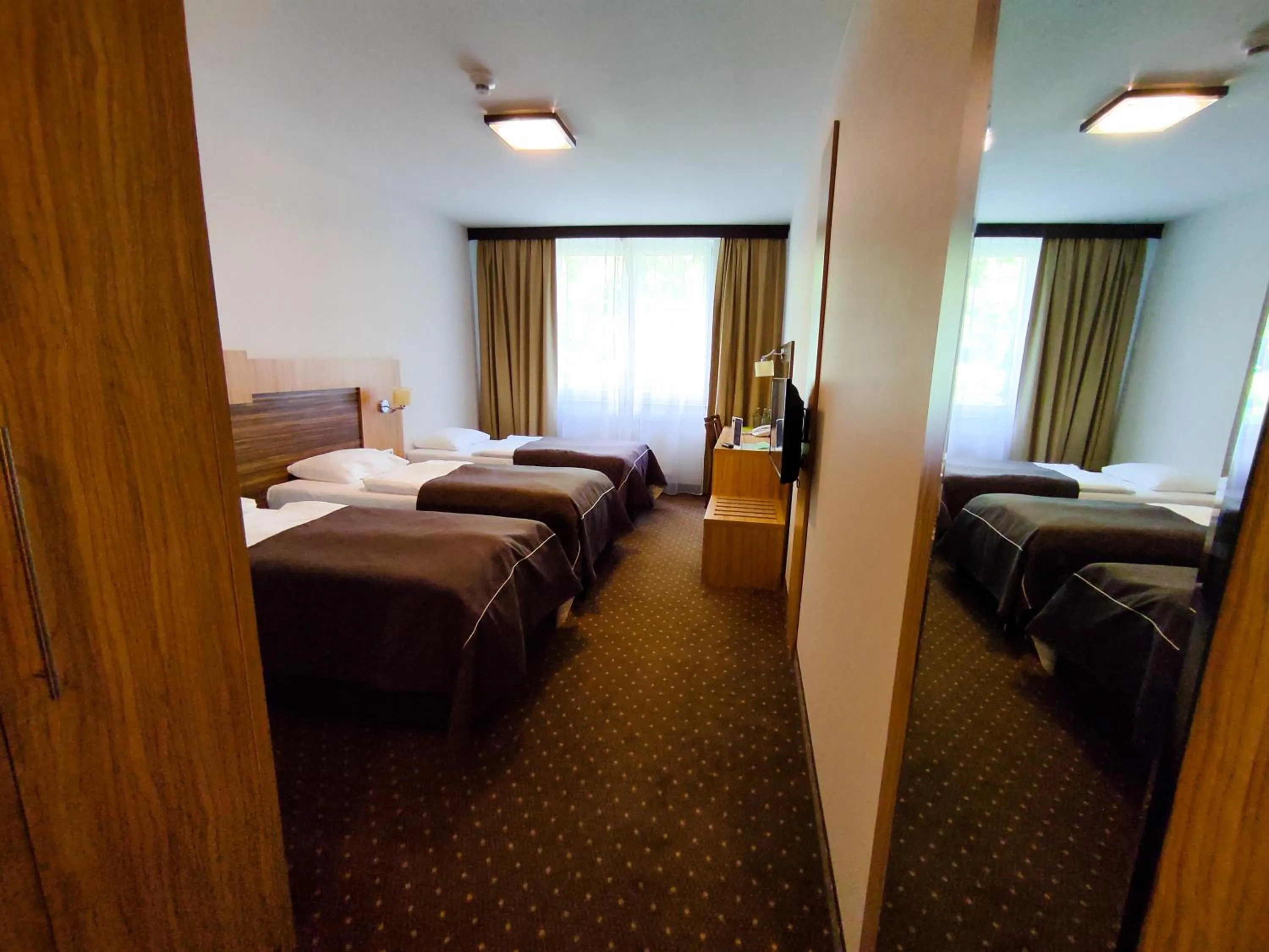 Photo of the whole room, Bed in Hotel Milenium