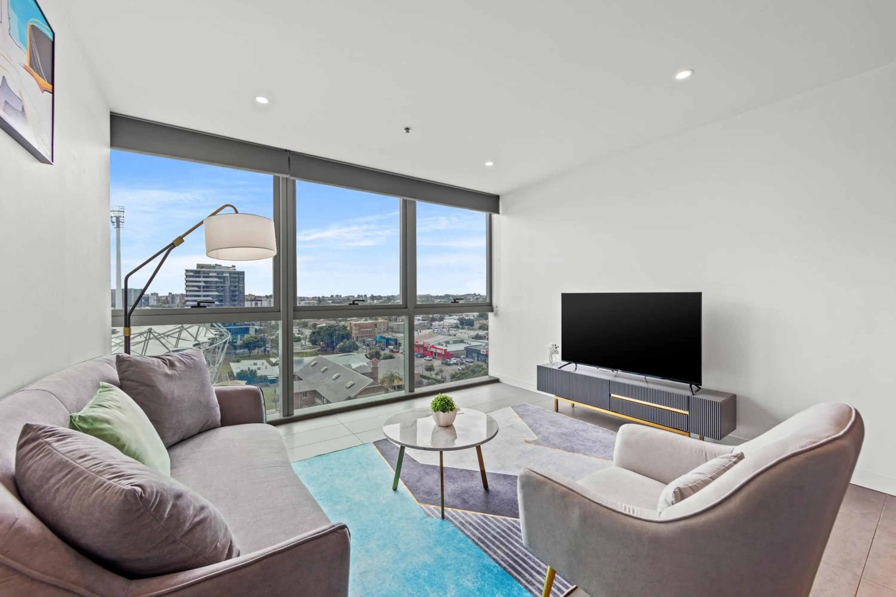 TV and multimedia in Trafalgar Lane Apartments by CLLIX