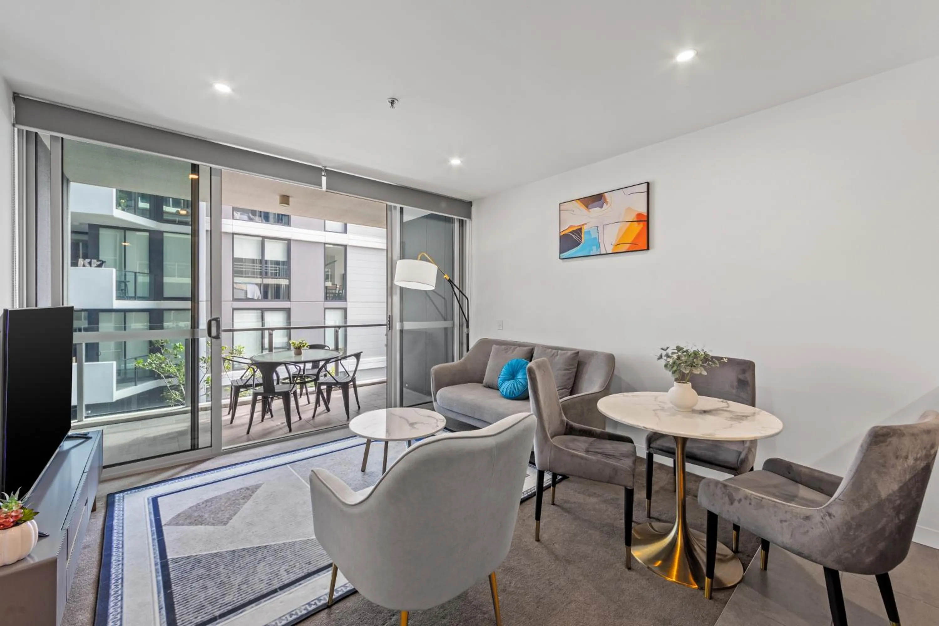 TV and multimedia in Trafalgar Lane Apartments by CLLIX