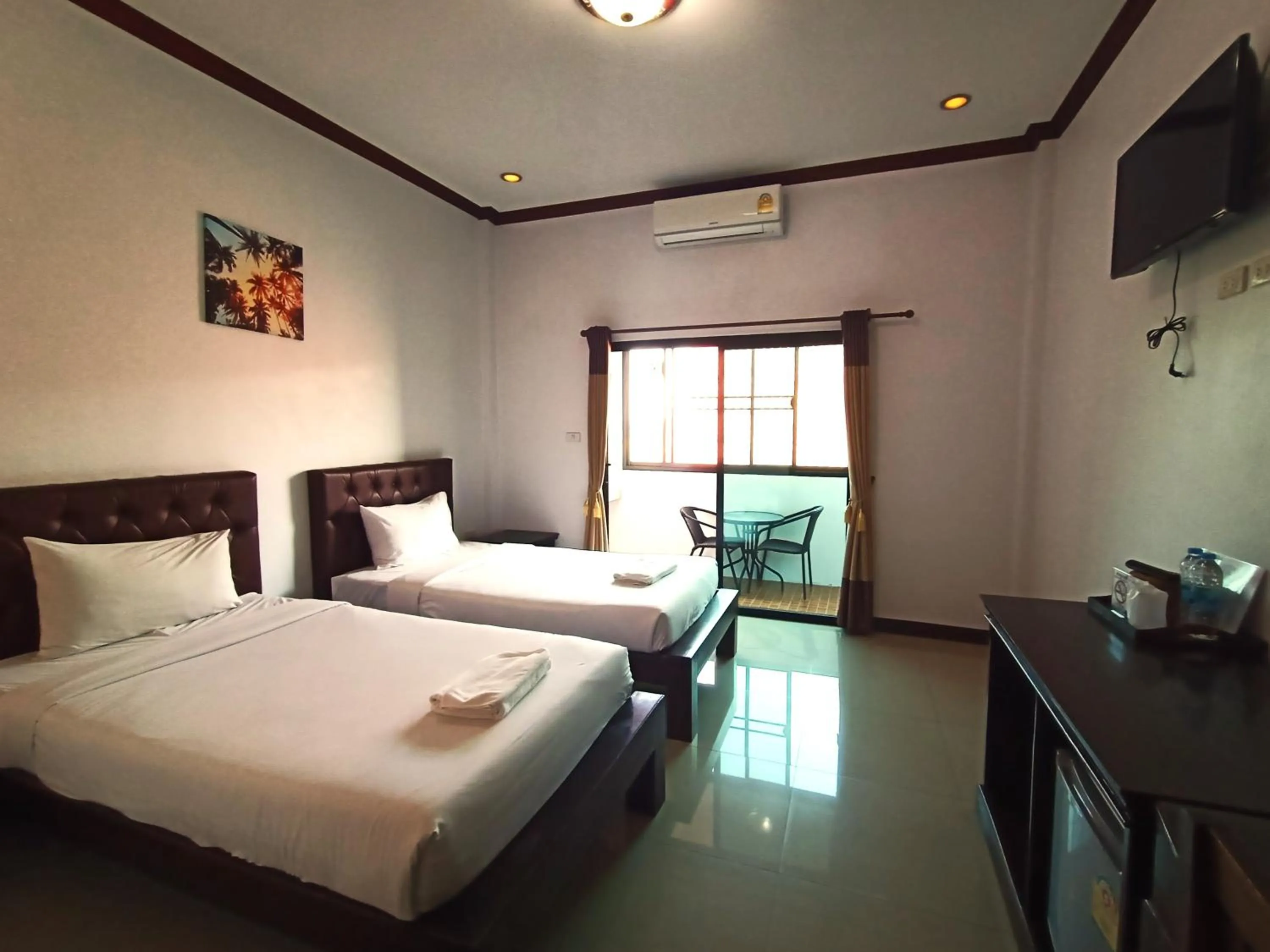 Bed in Be One Boutique Resort