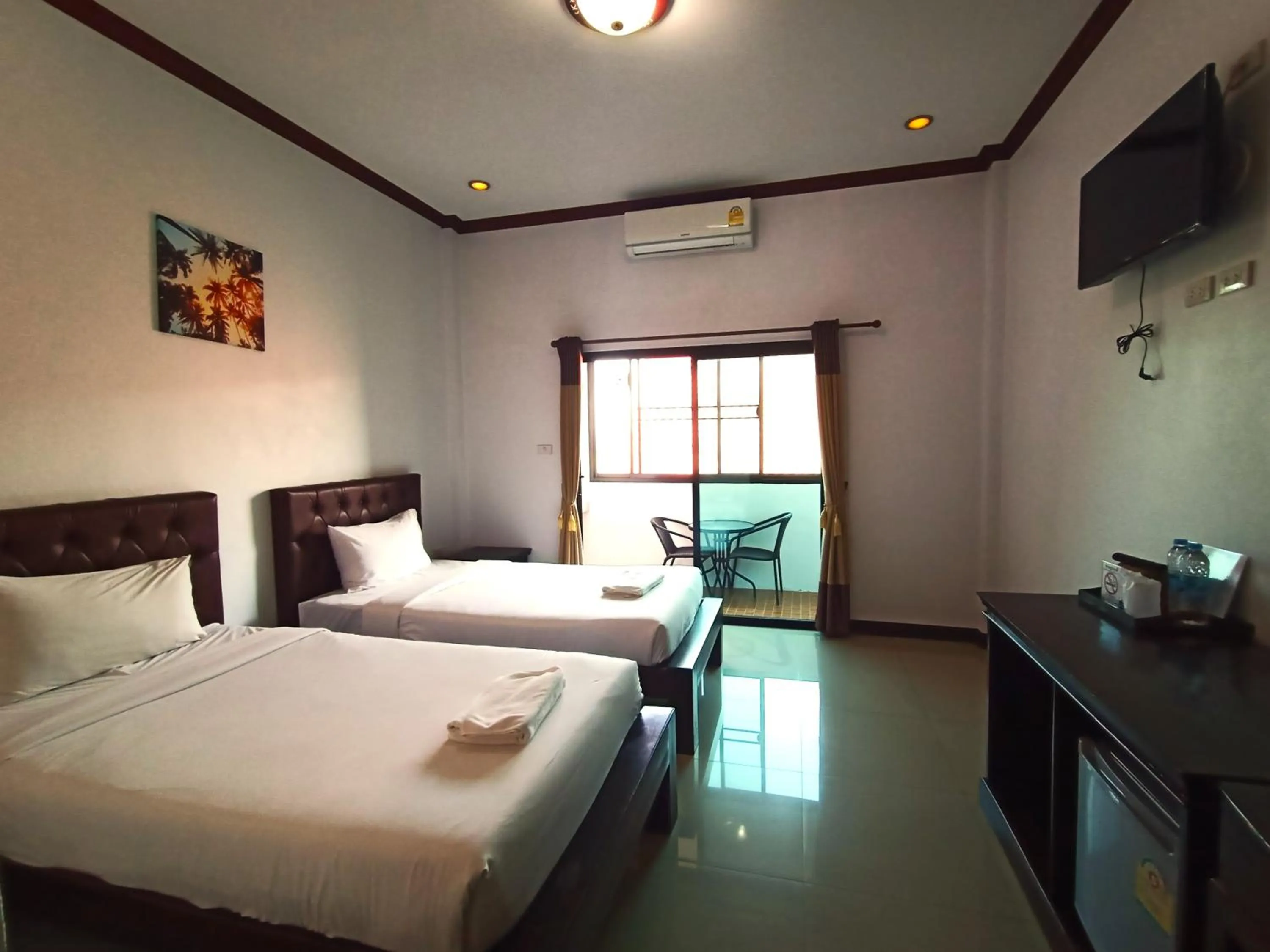 Bed in Be One Boutique Resort