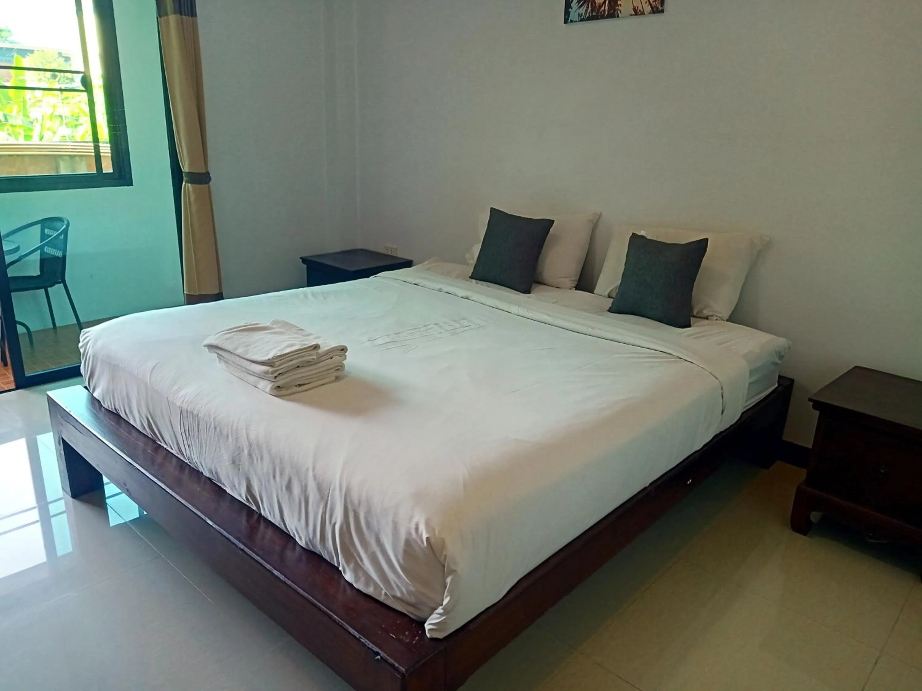 Bed in Be One Boutique Resort