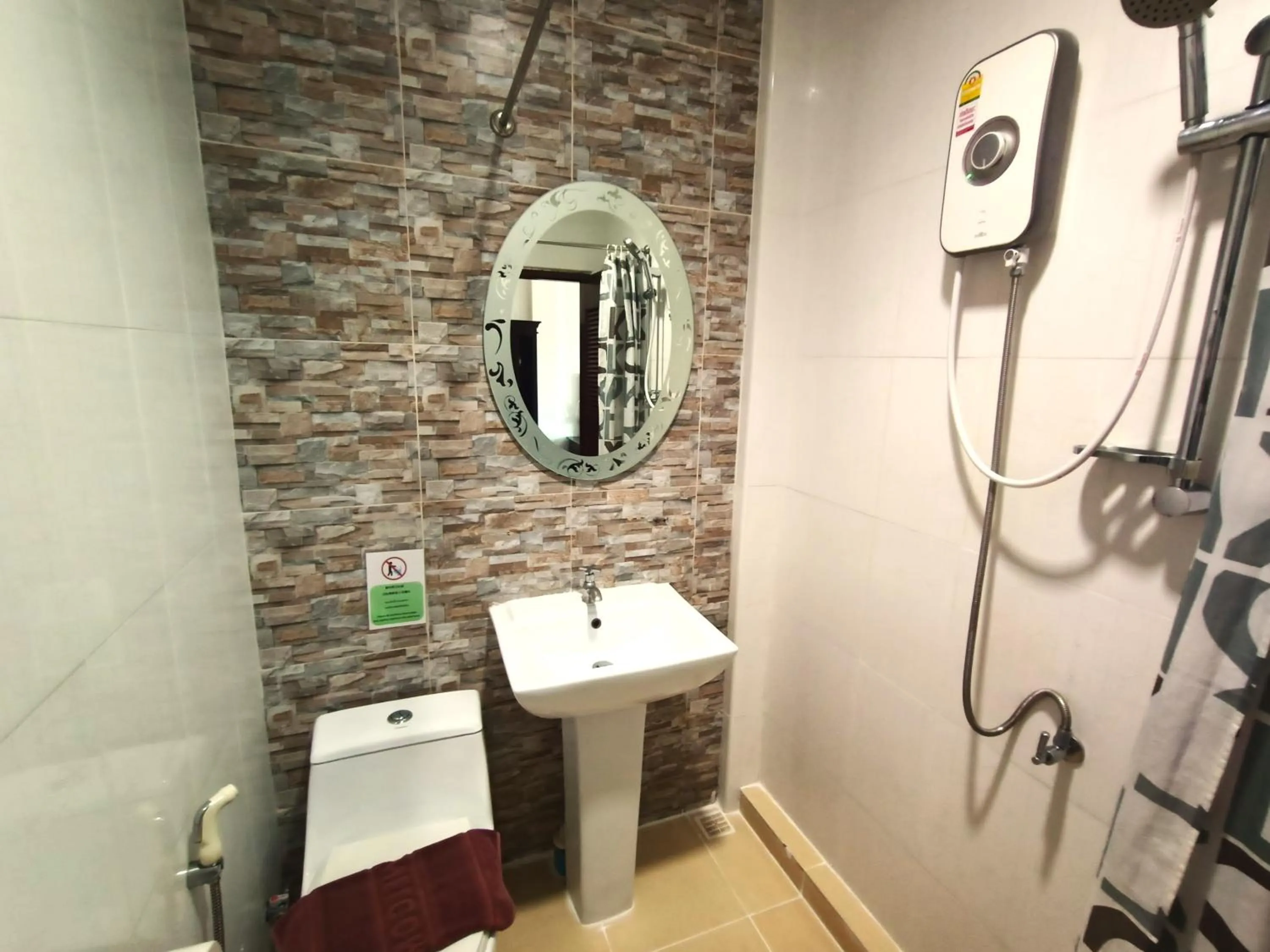 Shower in Be One Boutique Resort