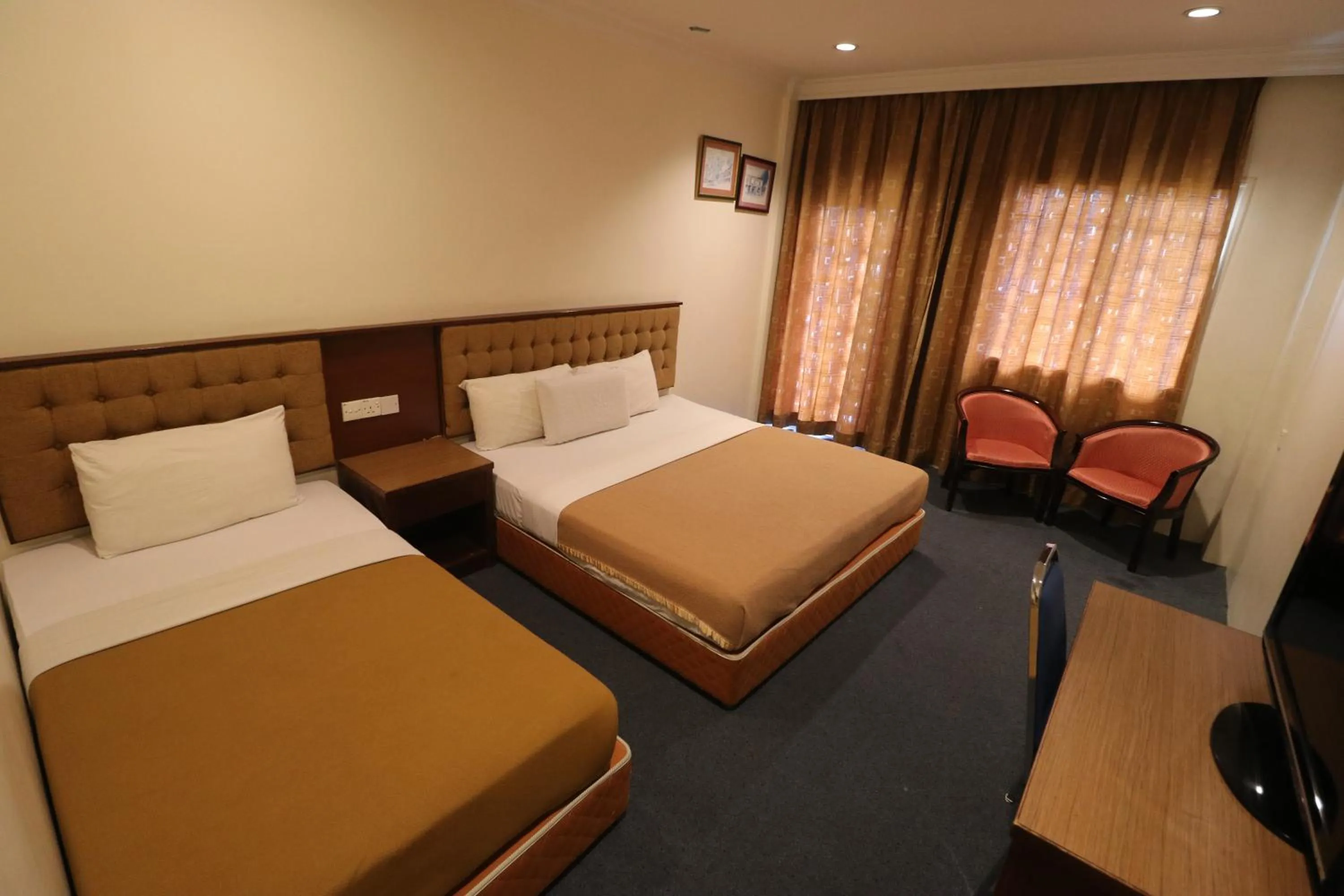 Bed in Iris House Hotel Cameron Highlands