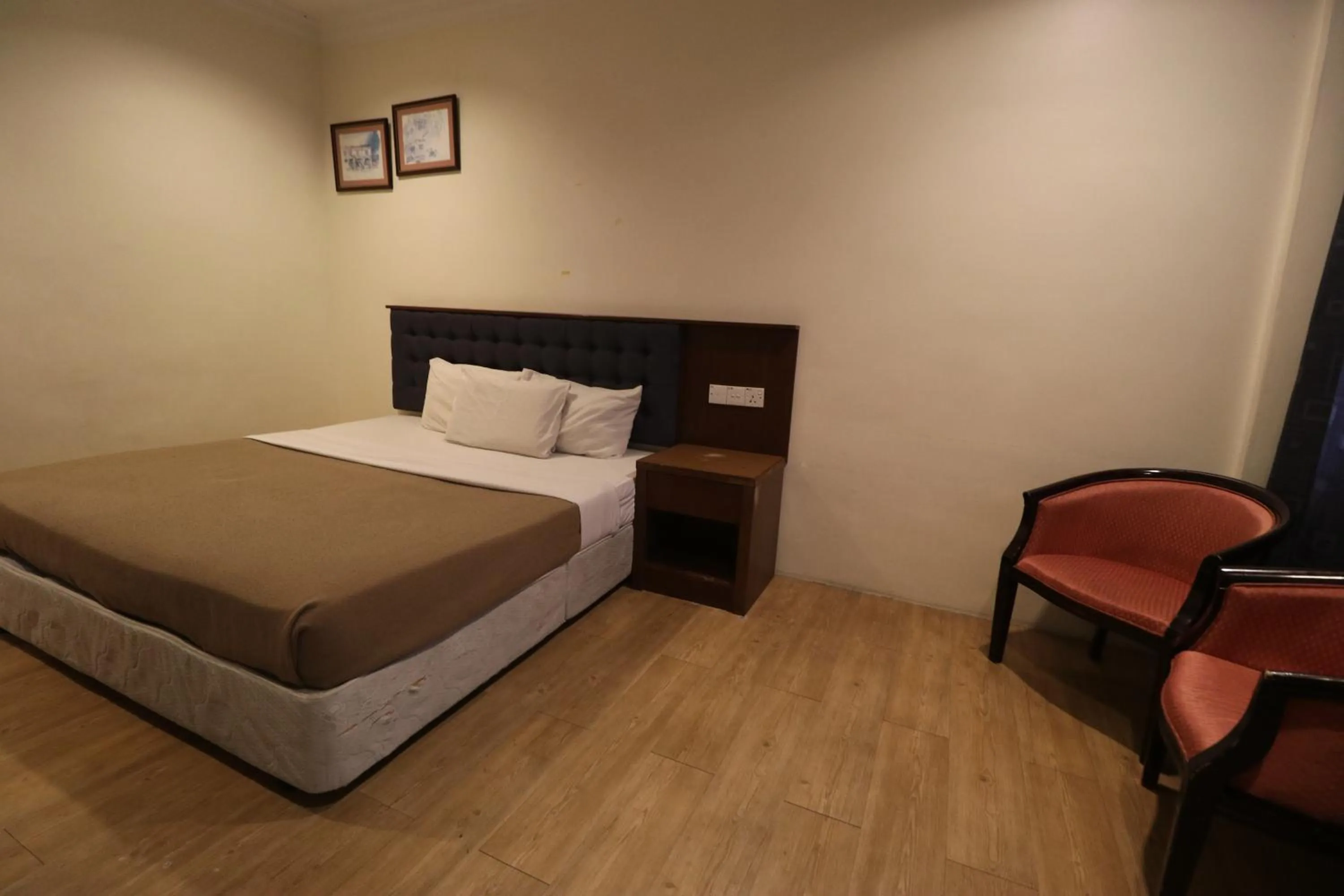 Bed in Iris House Hotel Cameron Highlands