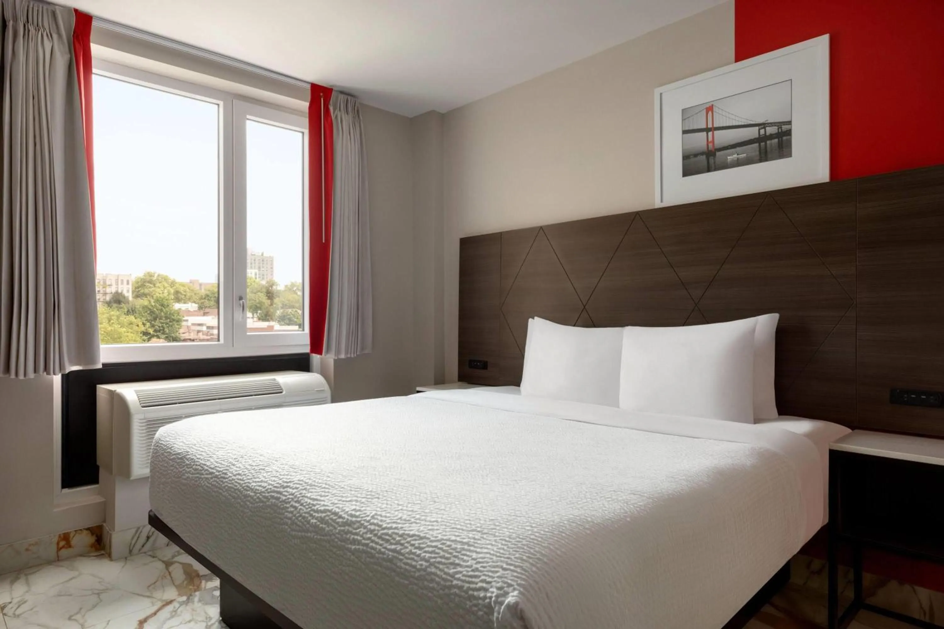 Photo of the whole room, Bed in Ramada by Wyndham Brooklyn Empire Blvd