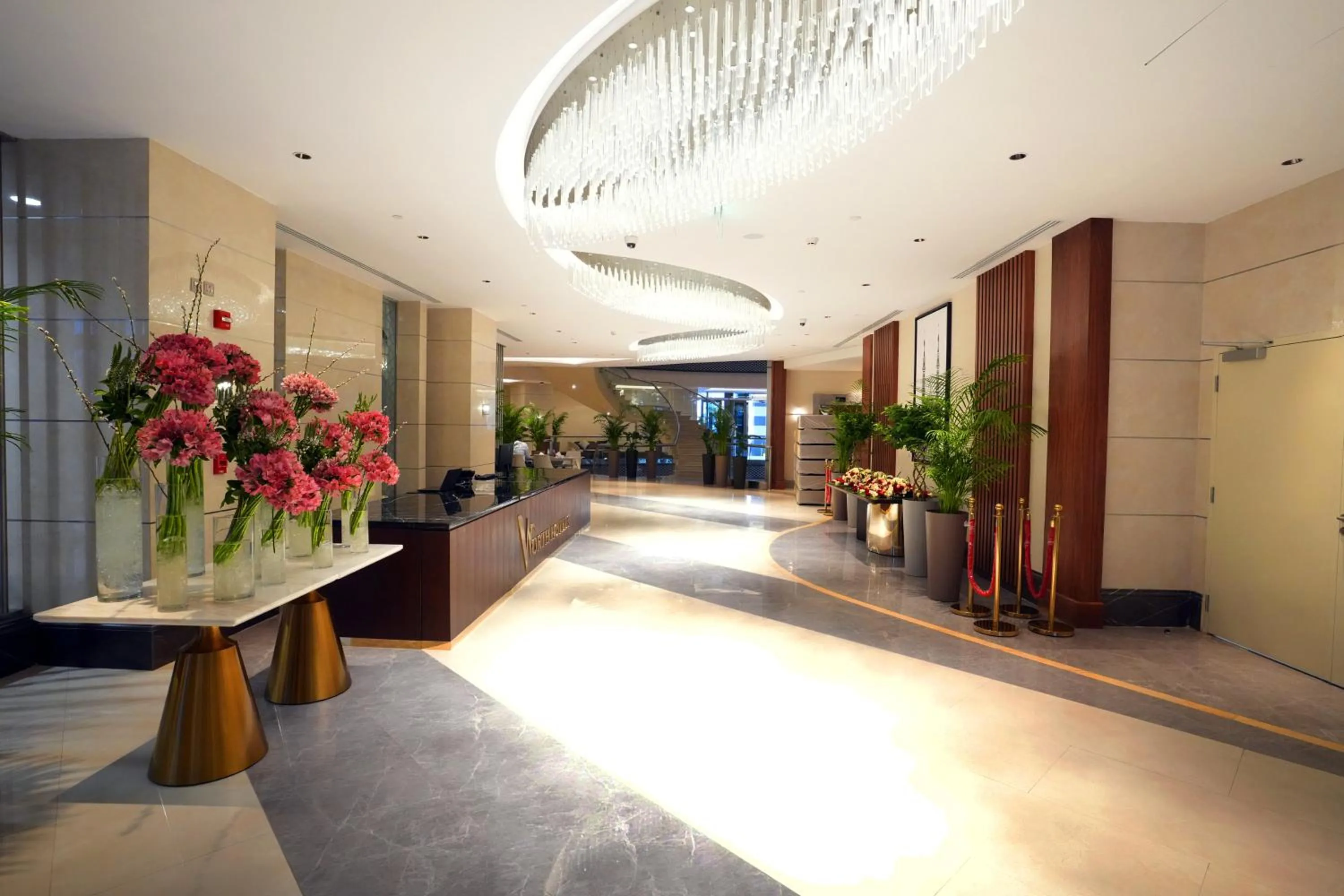 Lobby or reception in Peninsula Worth Hotel