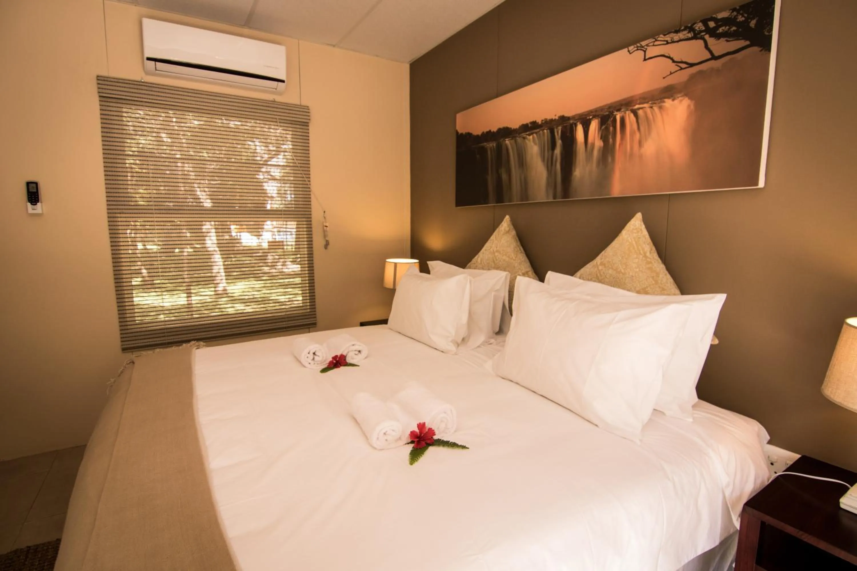 Bedroom, Bed in The Victoria Falls Waterfront