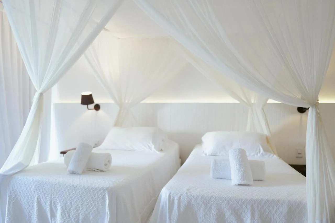 Bed in Pousada Brisas do Espelho