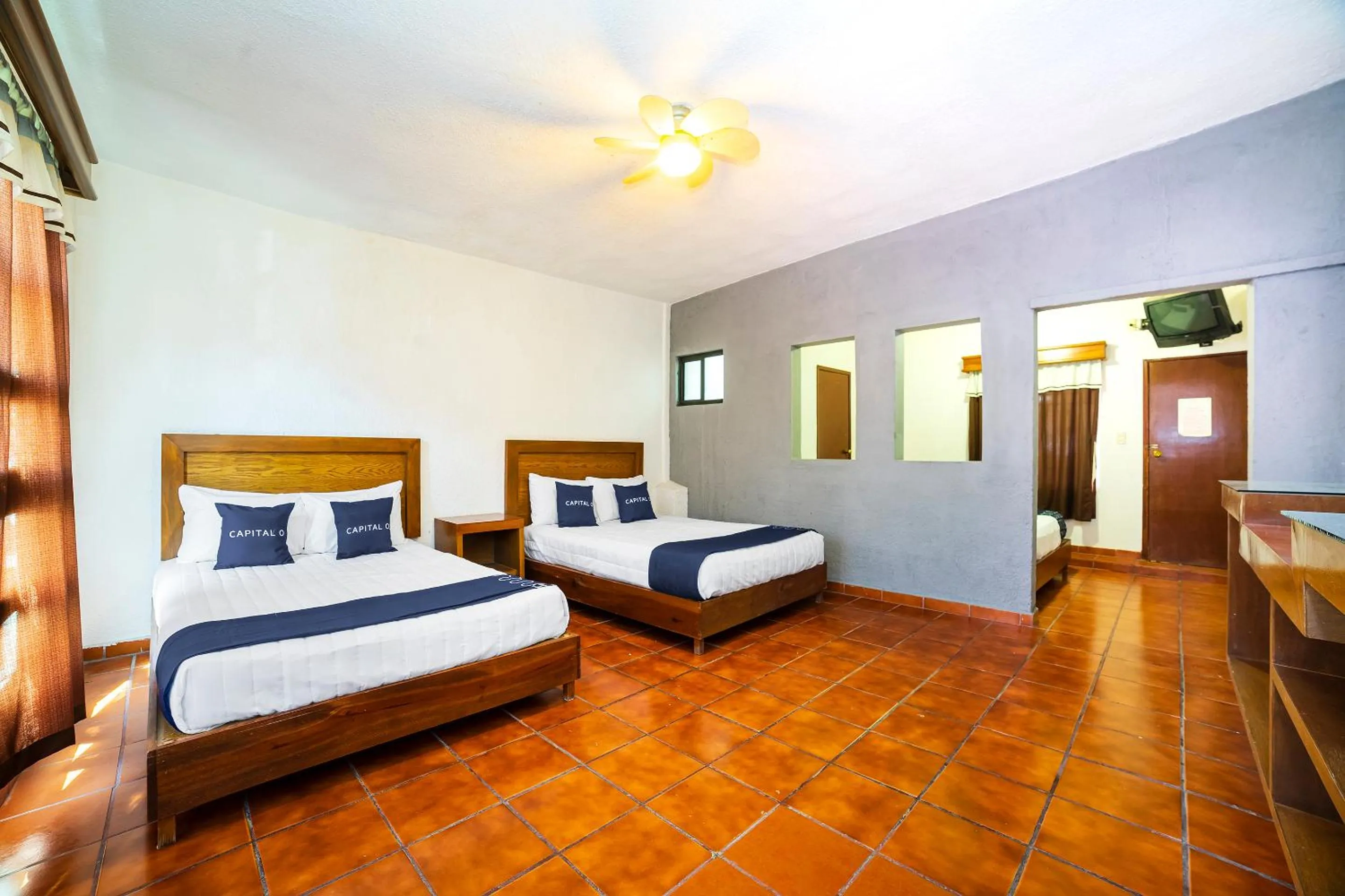 Bedroom, Bed in Capital O Hotel Casa Blanca