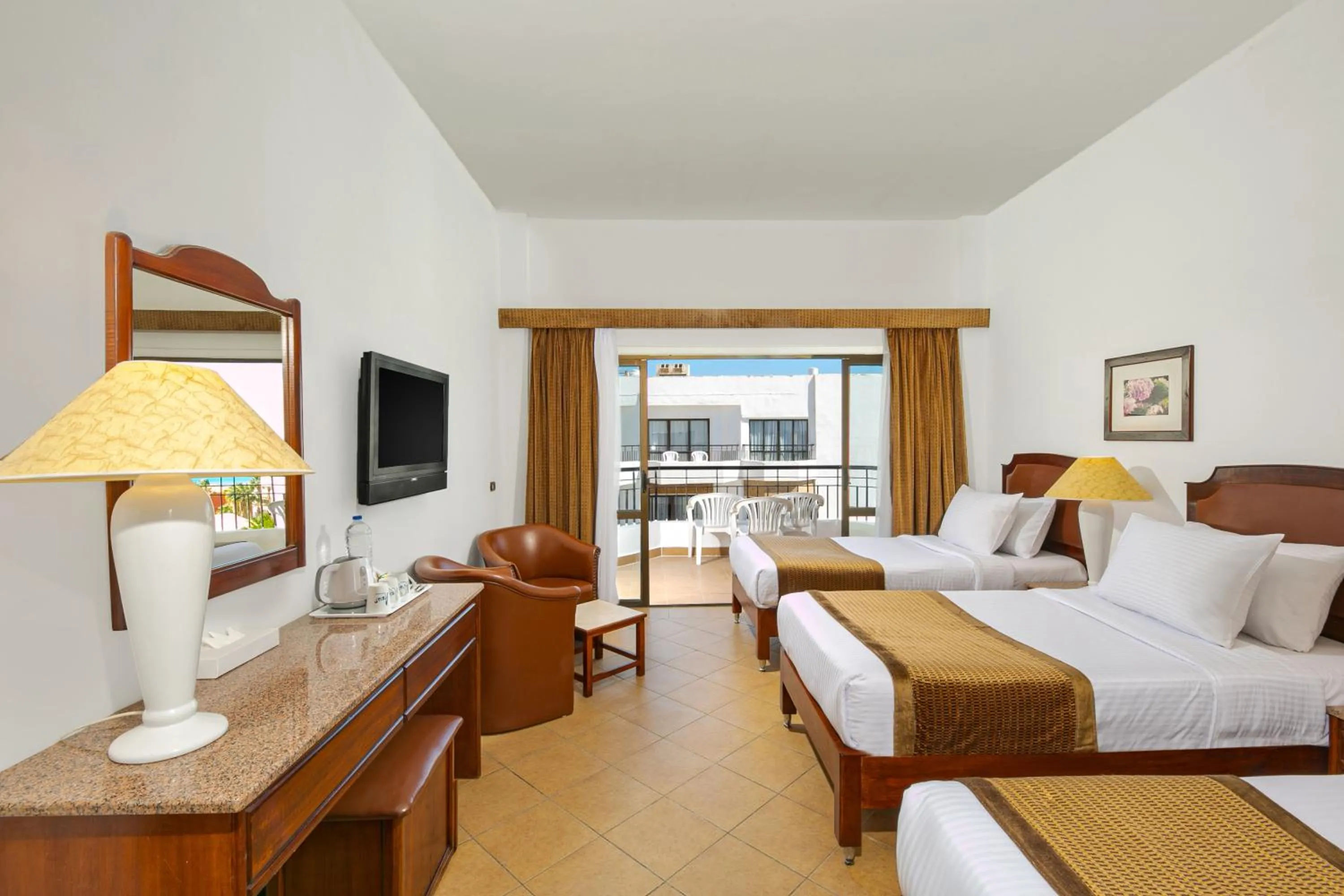 Bed in Marlin Inn Azur Resort