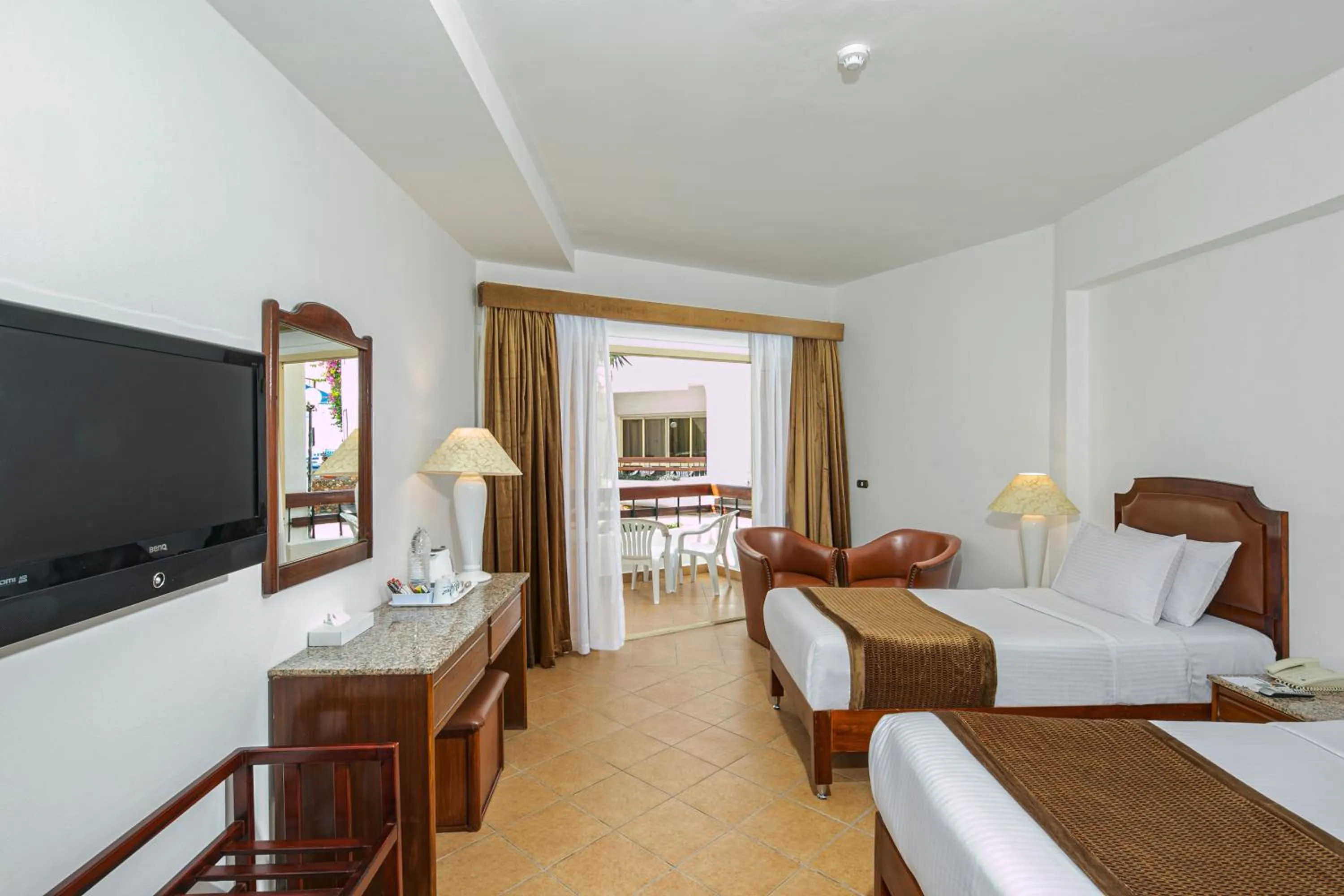 Bed in Marlin Inn Azur Resort