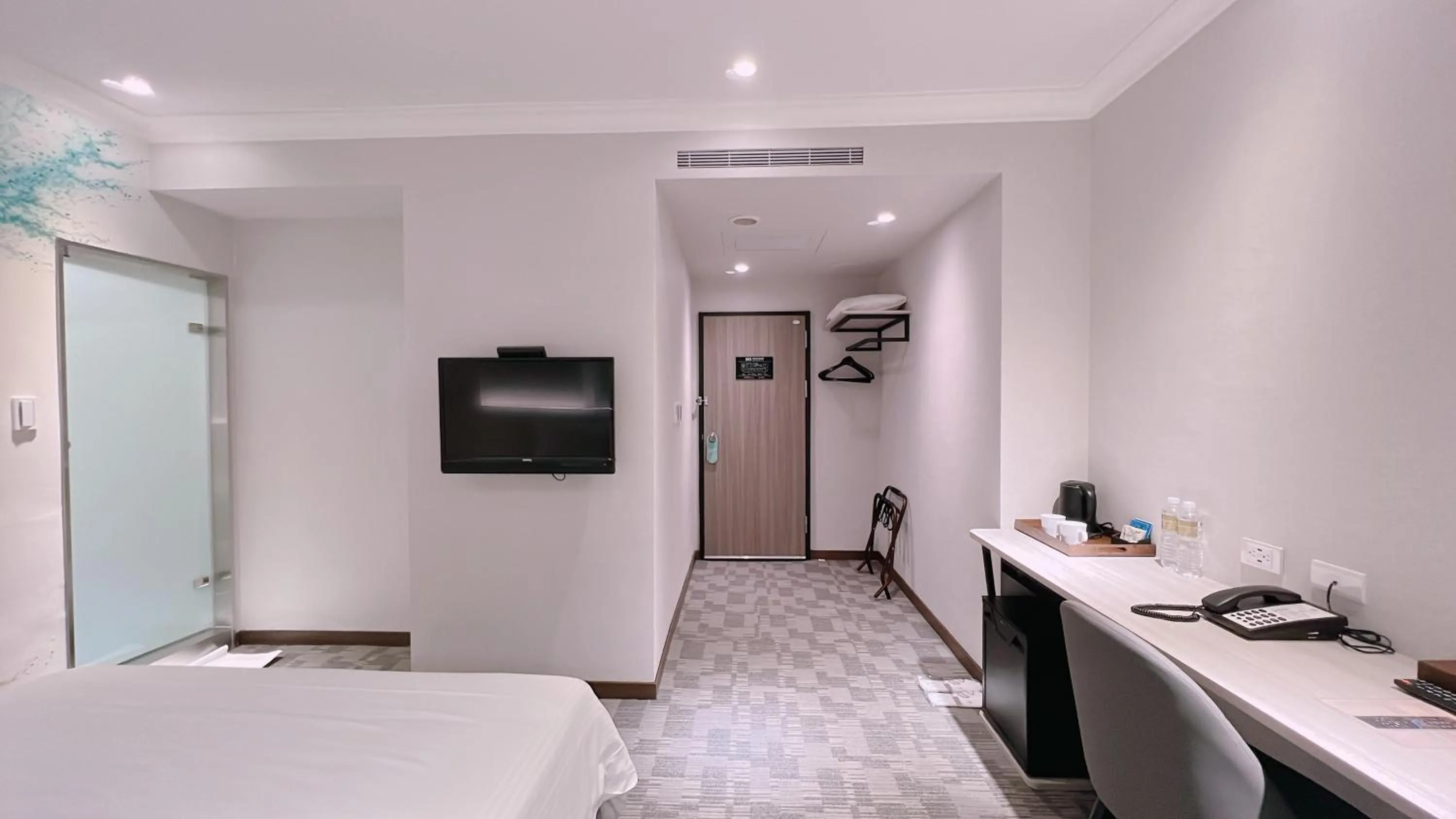 Bed in East Dragon Hotel