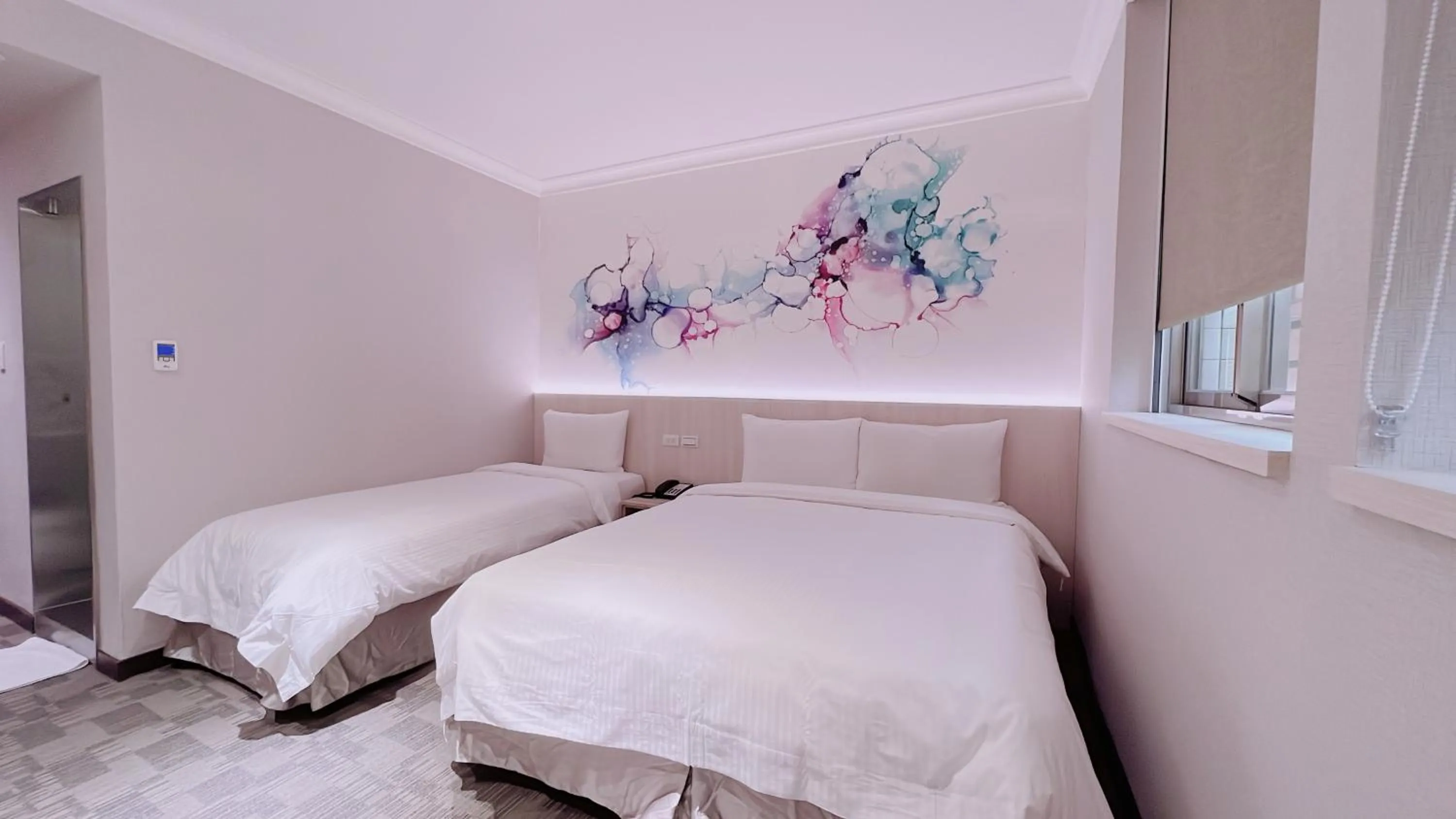 Bed in East Dragon Hotel