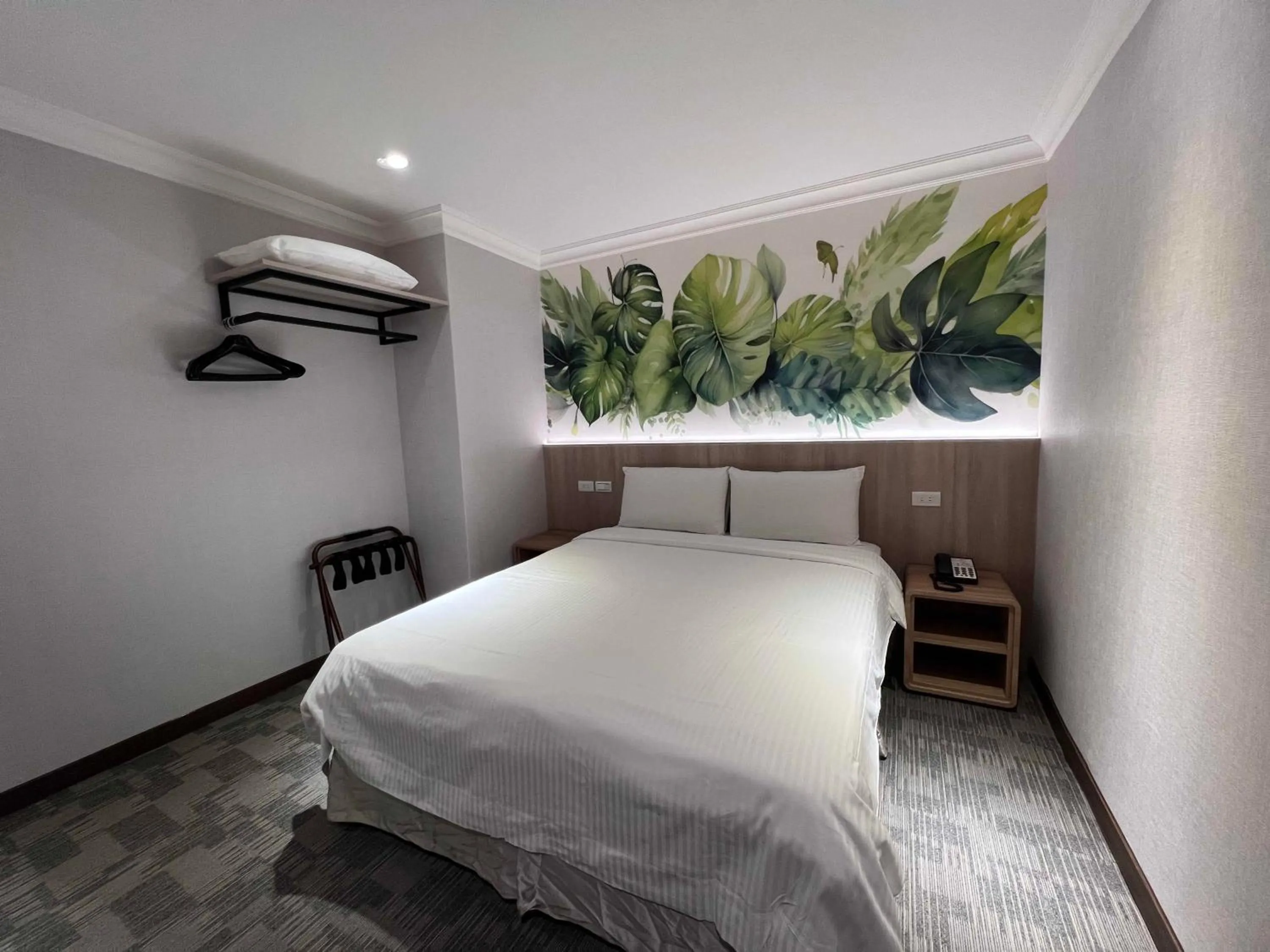 Bed in East Dragon Hotel