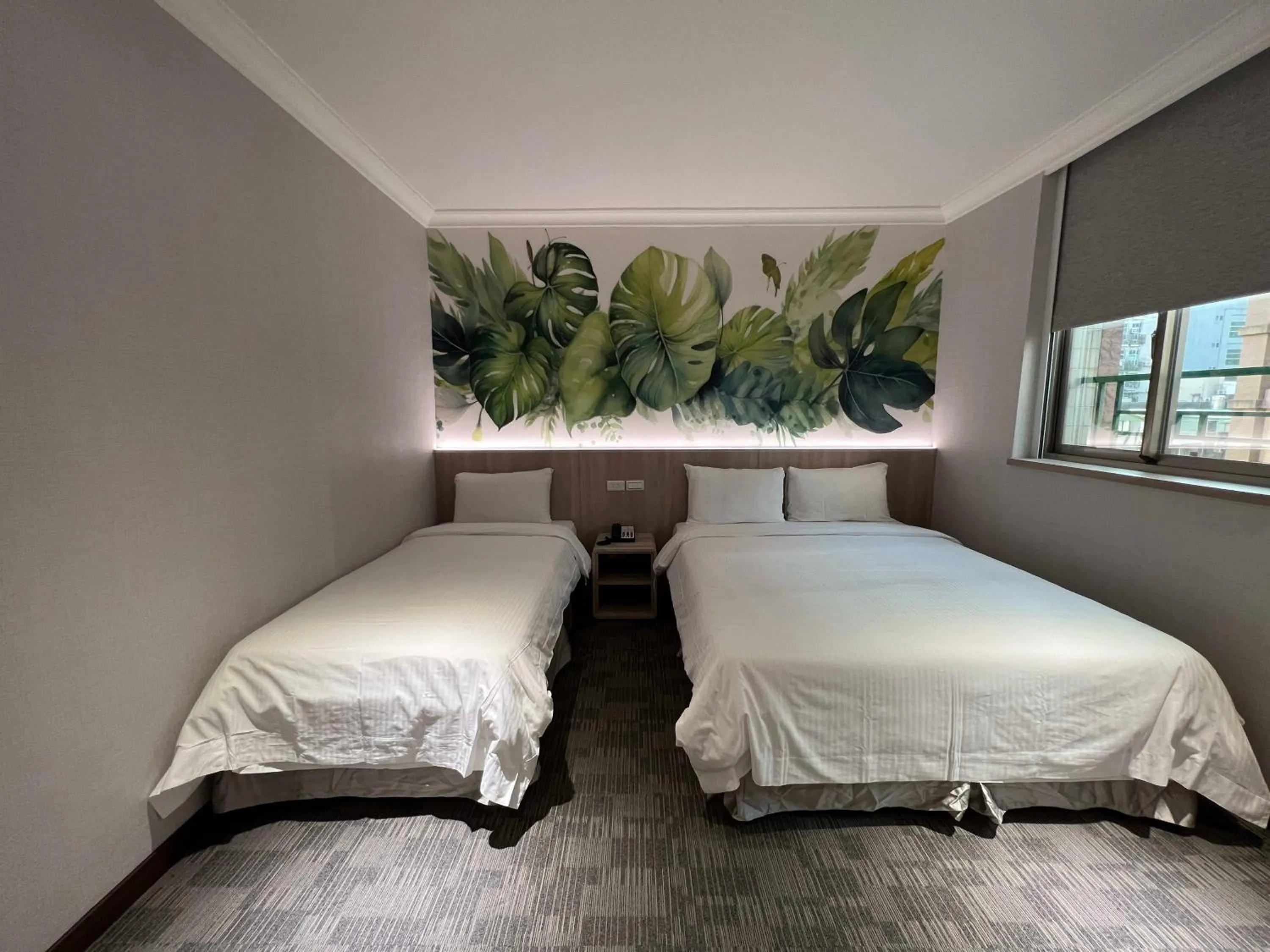 Bed in East Dragon Hotel