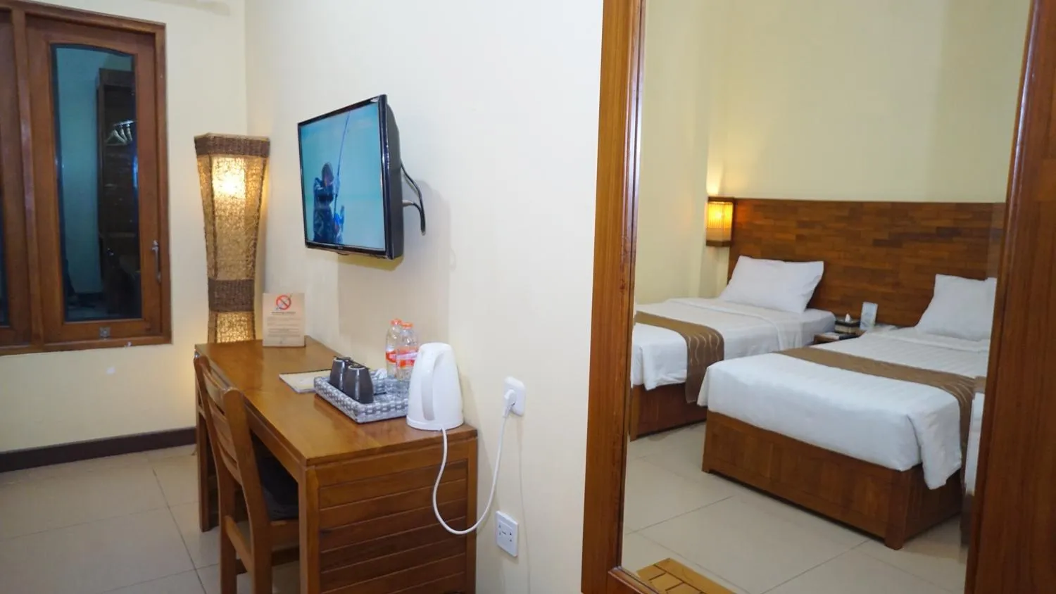 Bed in Syailendra Hotel Syariah