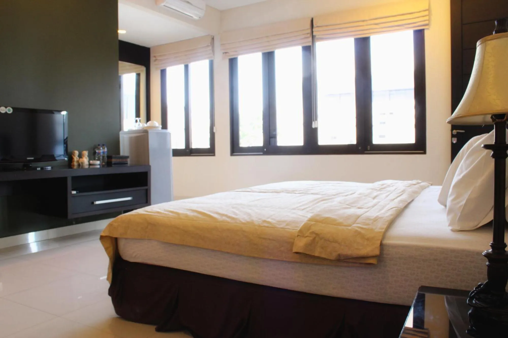 Bed in InKuta Residence and Villa