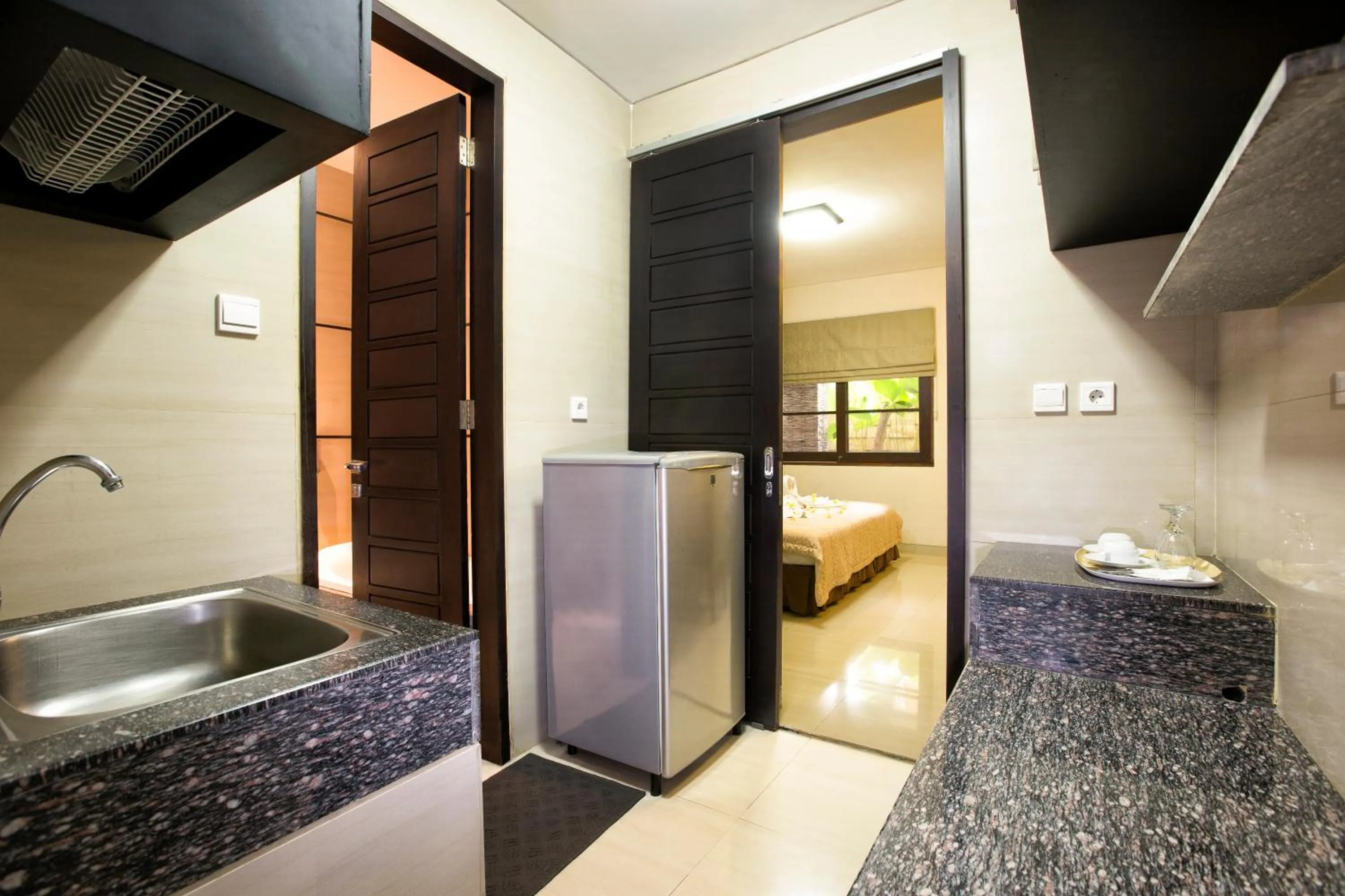 Coffee/tea facilities, Bed in InKuta Residence and Villa