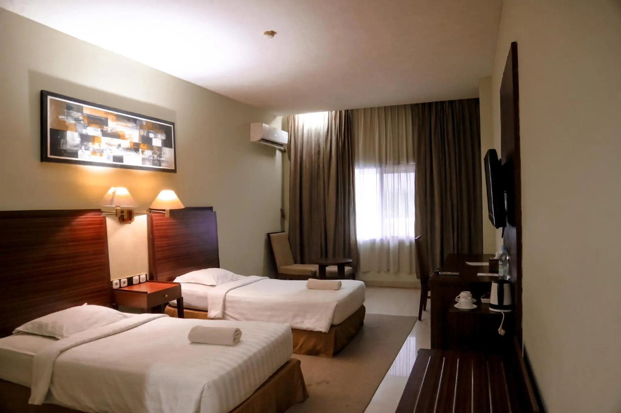 Bed in Hotel Mariat Sorong