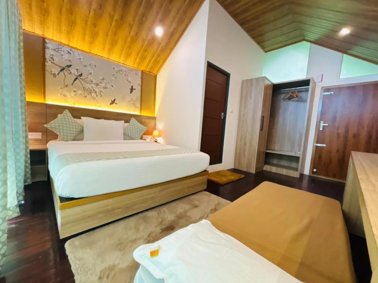 Photo of the whole room, Bed in Bamboo Dale Resort & Spa Munnar by Stride
