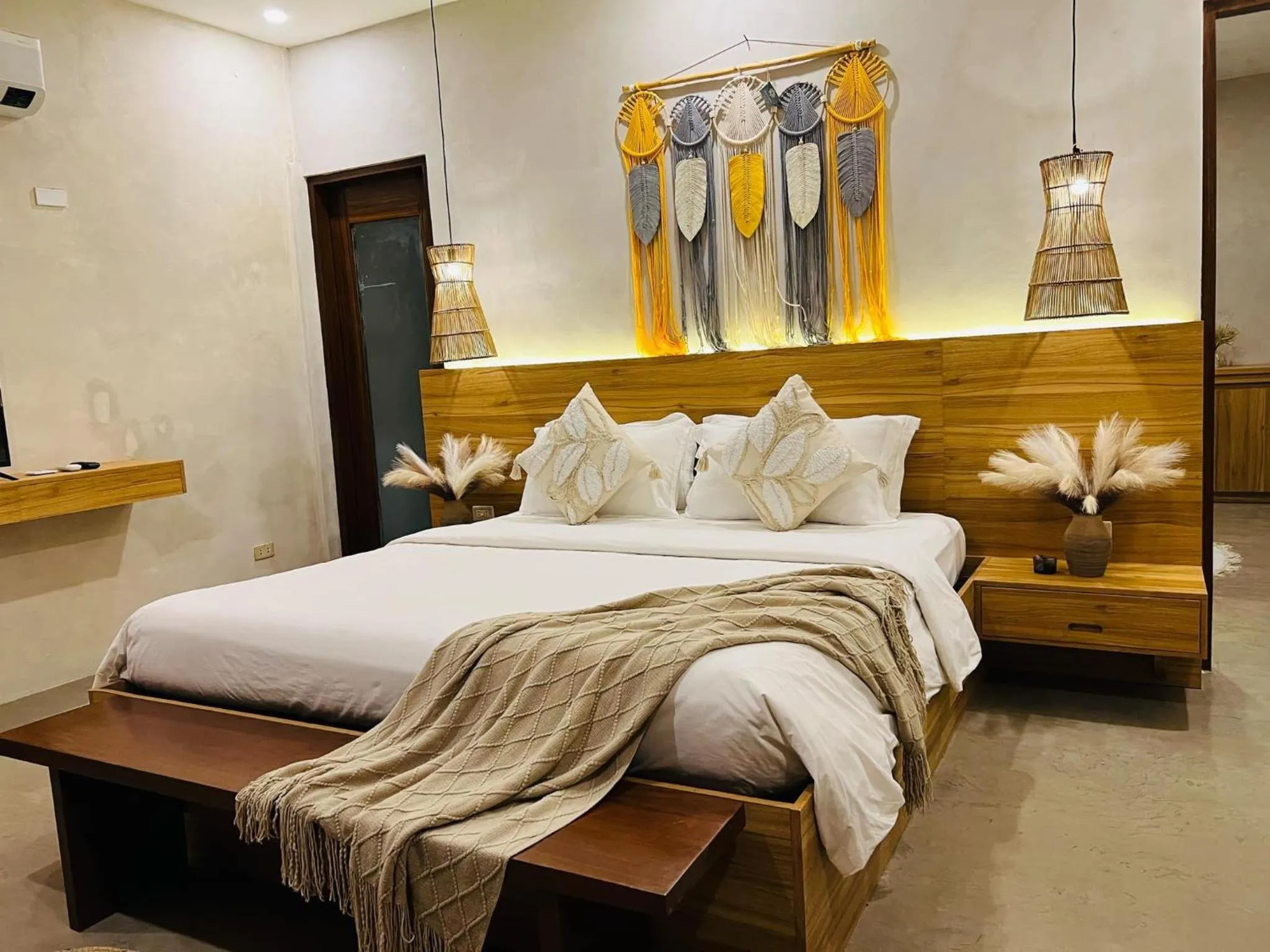 Bed in Lio Villas Resort