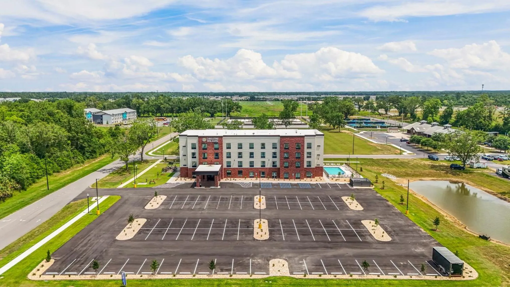 Property building in Cobblestone Hotel & Suites - Foley