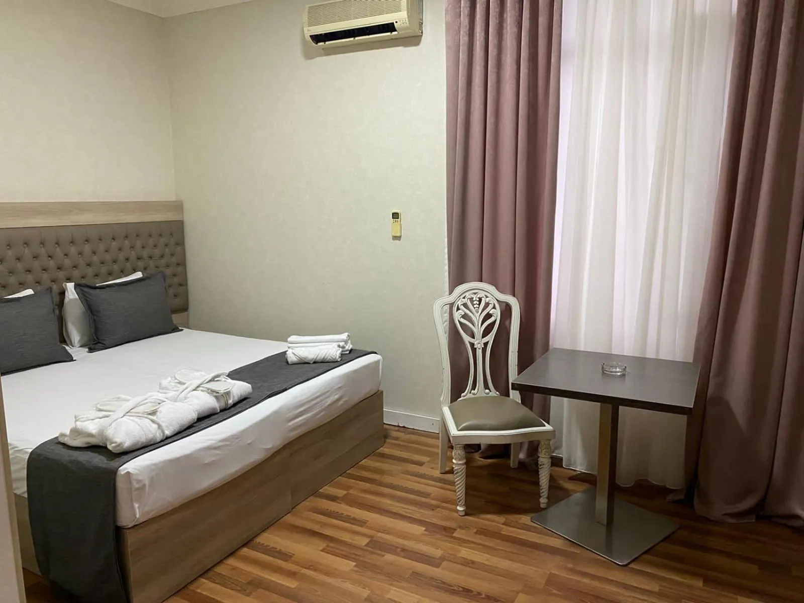 Bed in Hotel Empire Business Baku