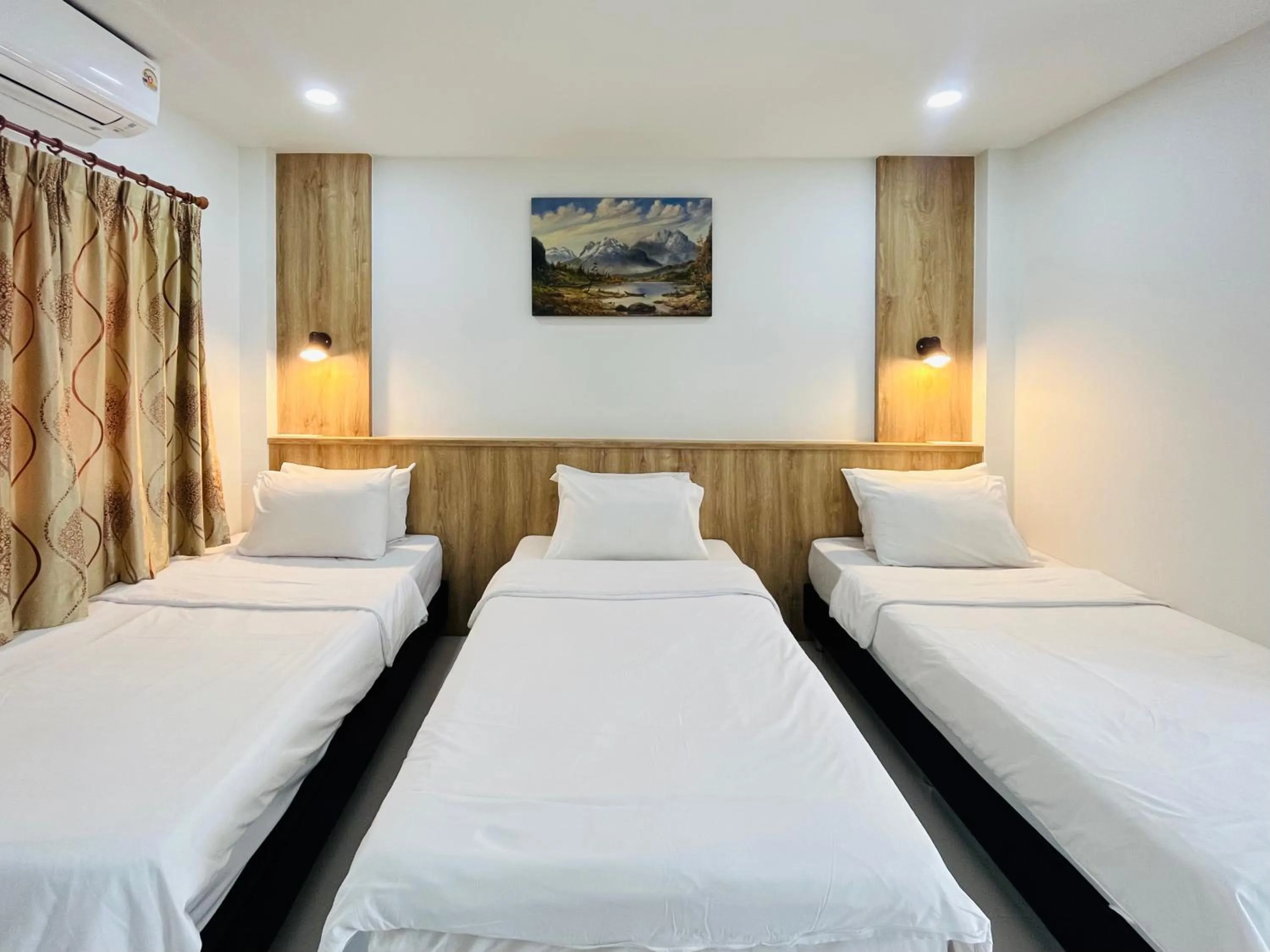 Bed in Rendezvous Oldtown Chiangmai