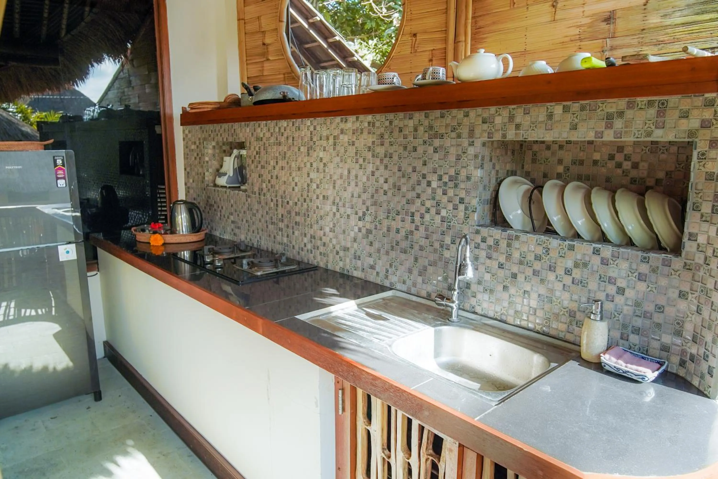 Kitchen or kitchenette in Villa Sujati