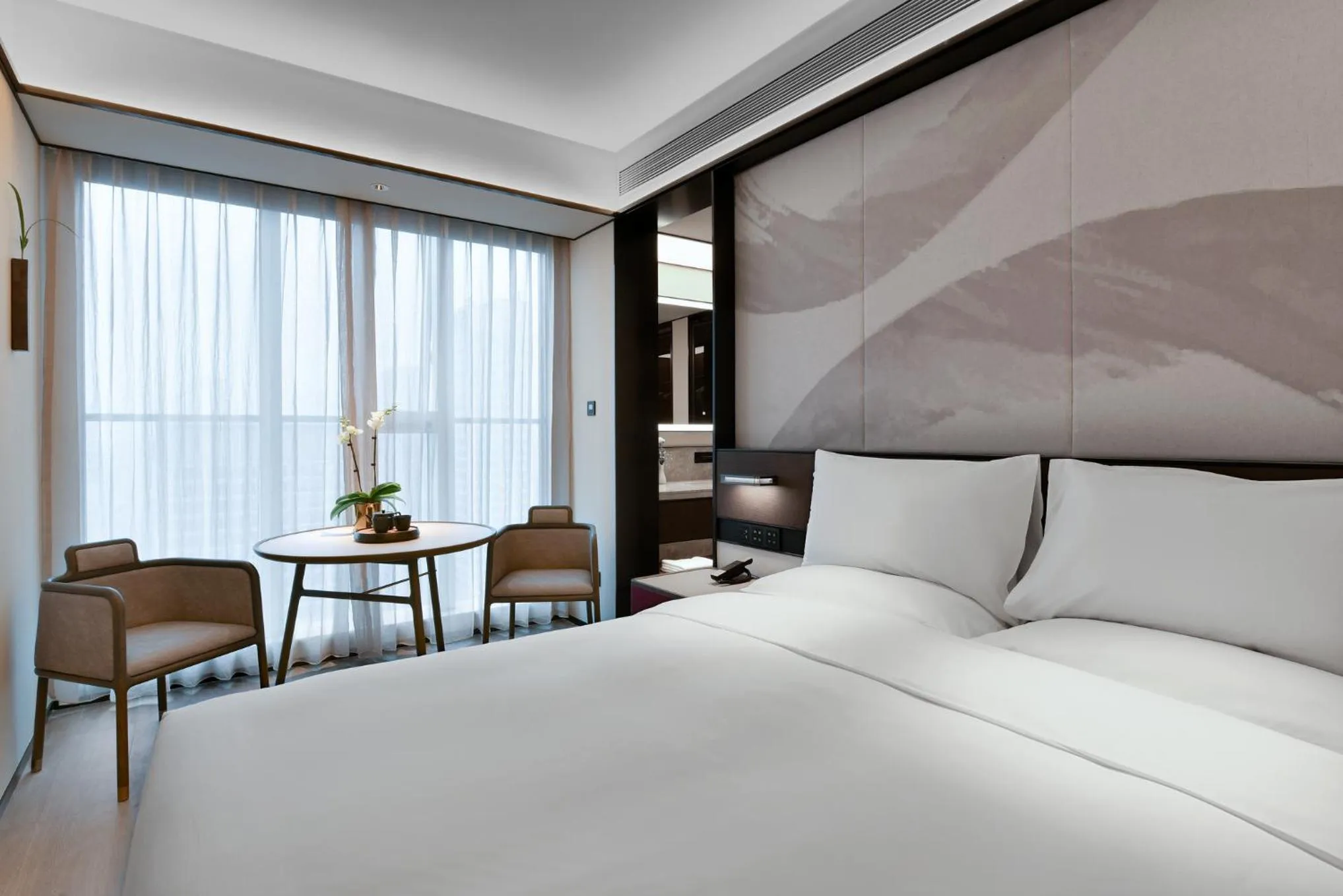 Photo of the whole room, Bed in JOYA Chengdu Taikoo Li IFS
