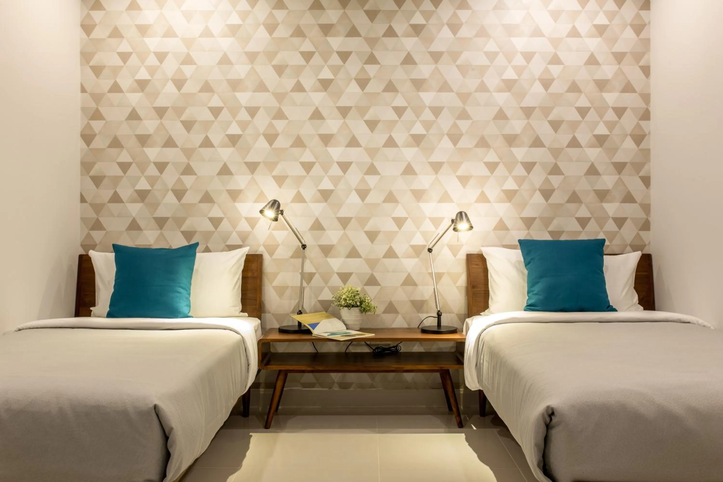 Bed in Tolani Nimman Villa Chiang Mai