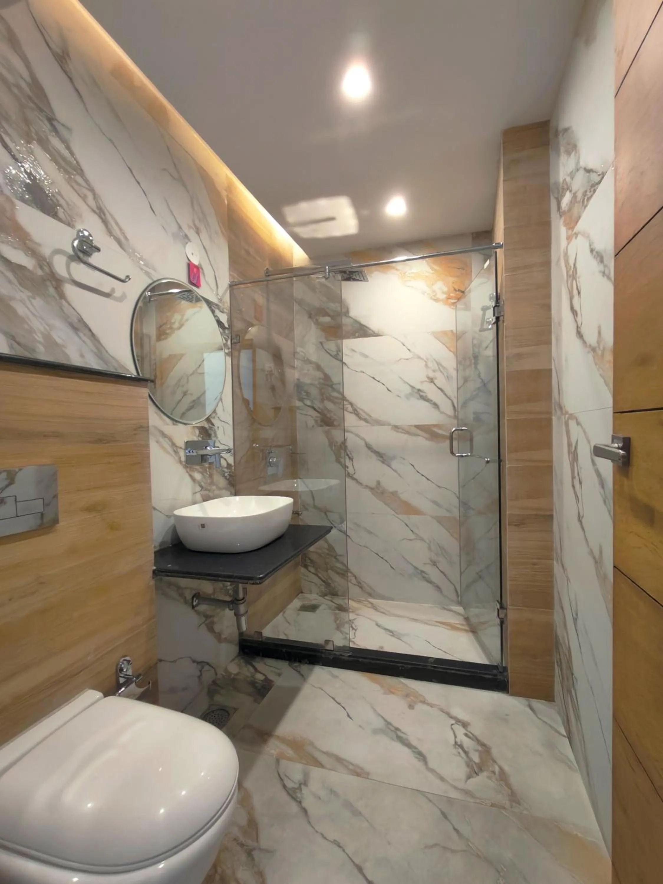 Shower in Luxury Inn by Stotrak Hotels