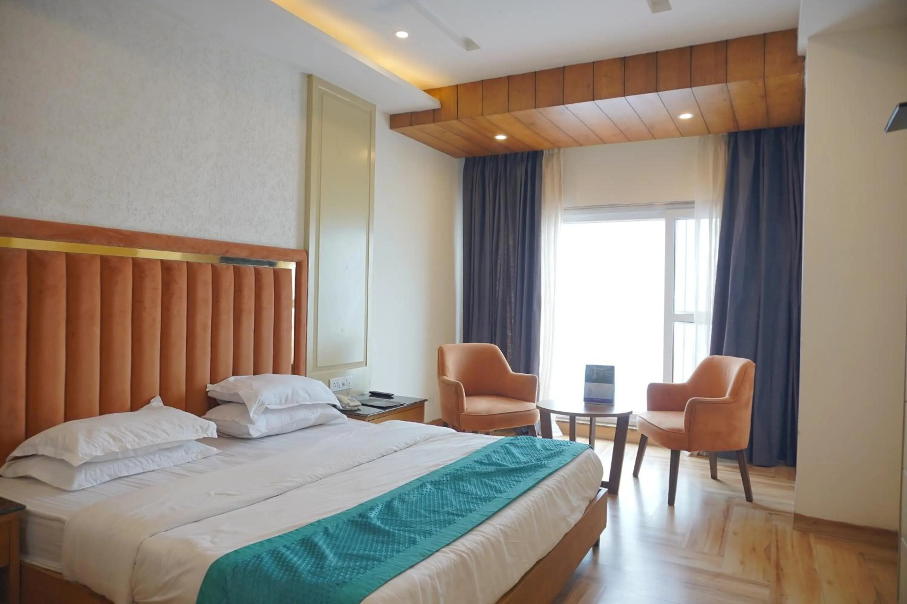 Bed in Luxury Inn by Stotrak Hotels