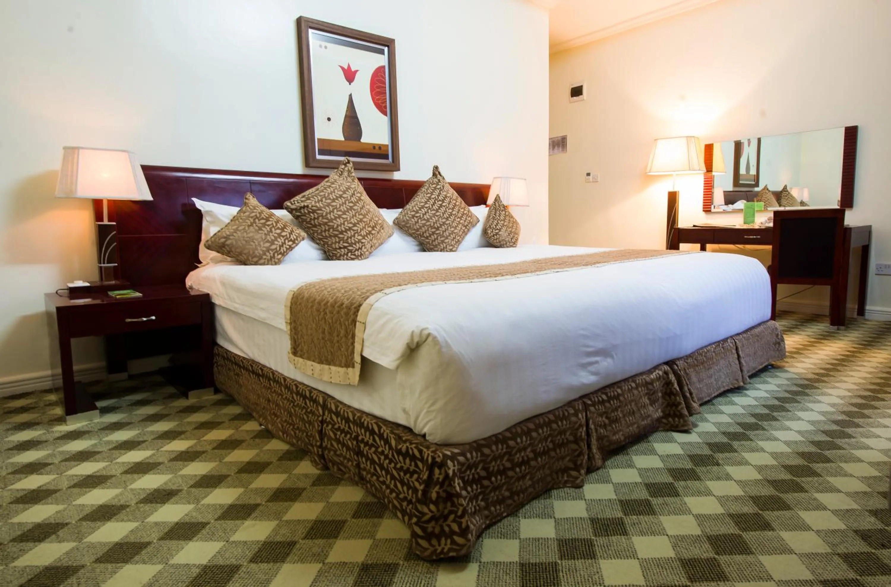 Bedroom in The Manor Hotel