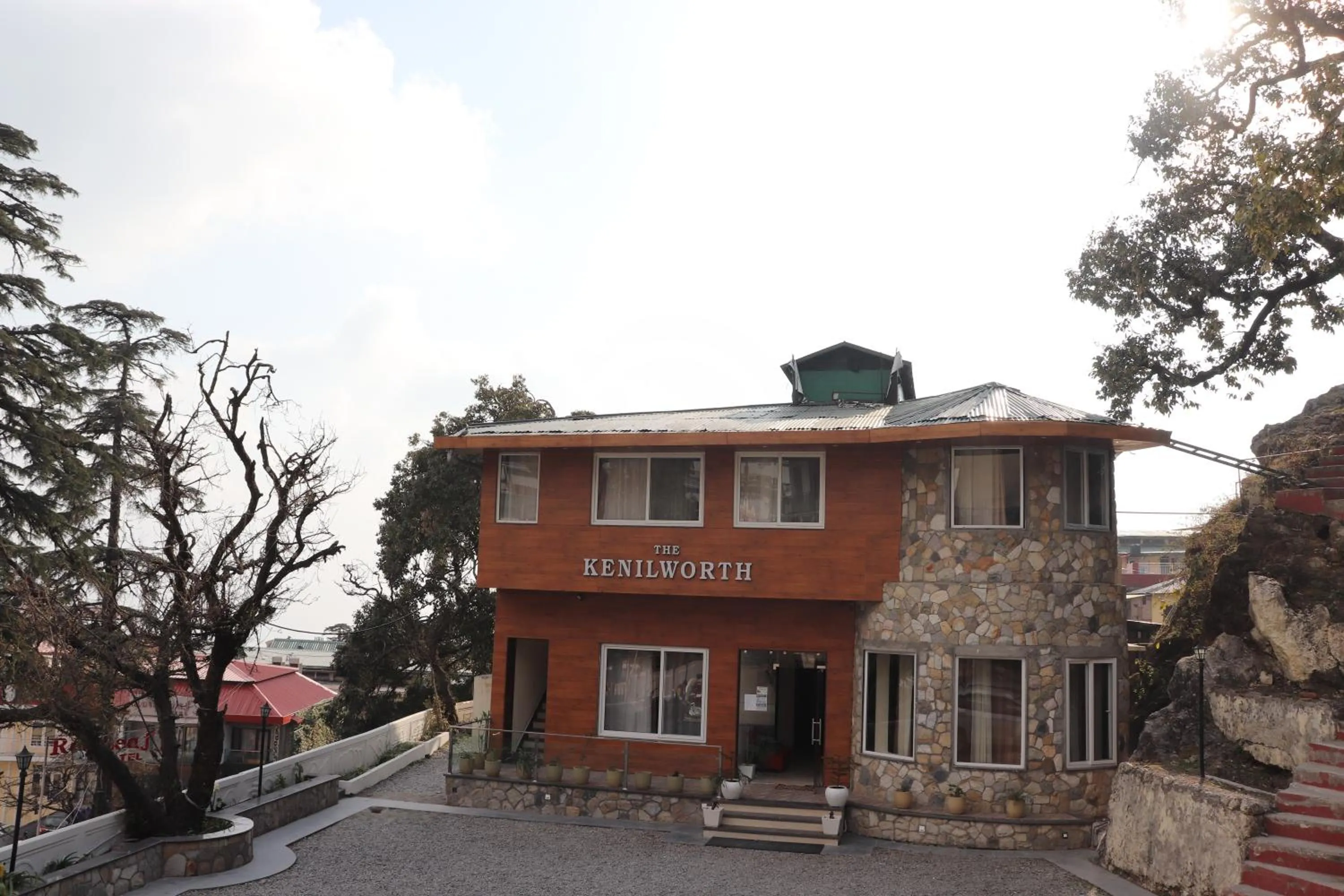 Property building in The Kenilworth Mussoorie by Stotrak On Mall Road with On-site Parking