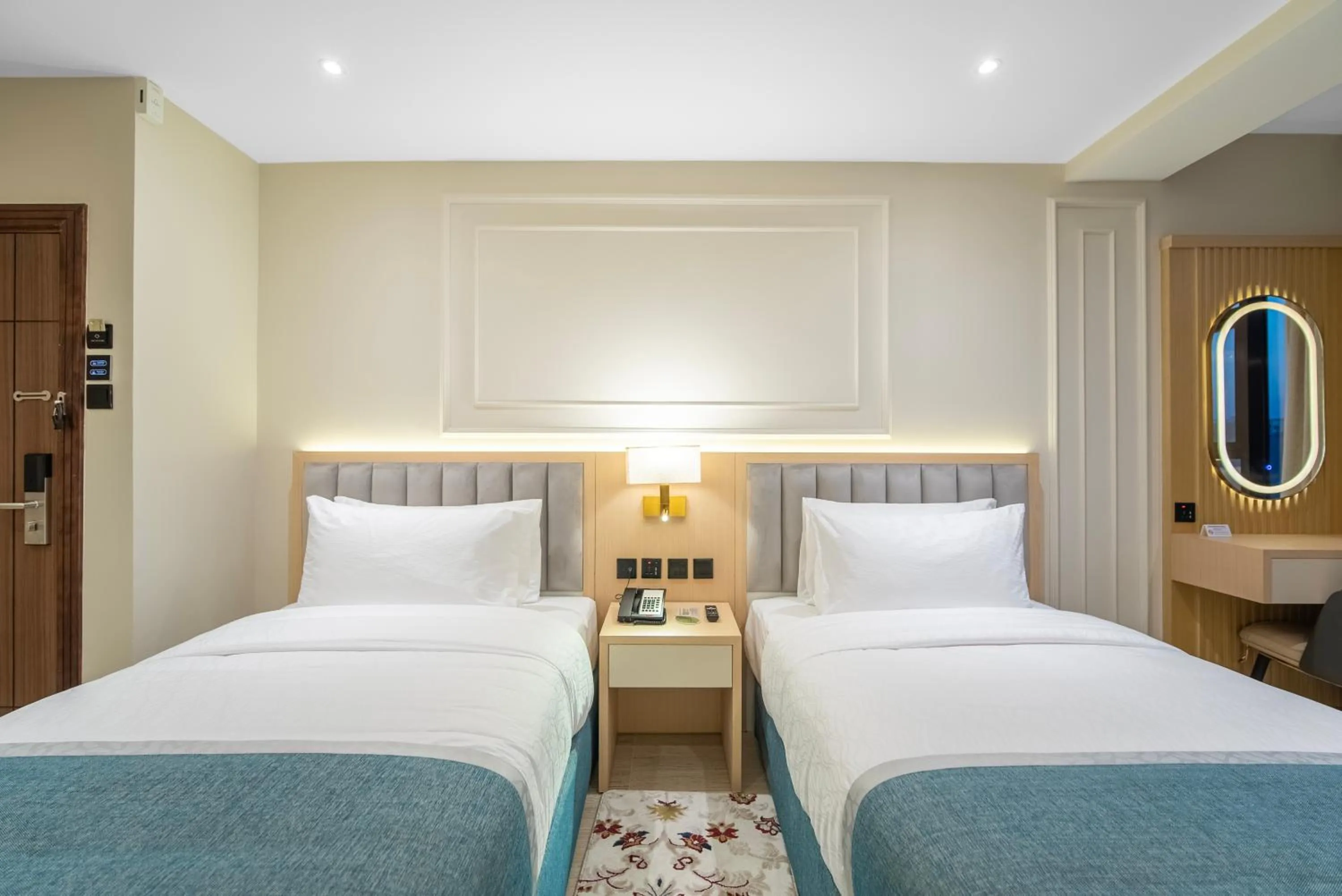 Bedroom, Bed in Grand Ambassador Hotel