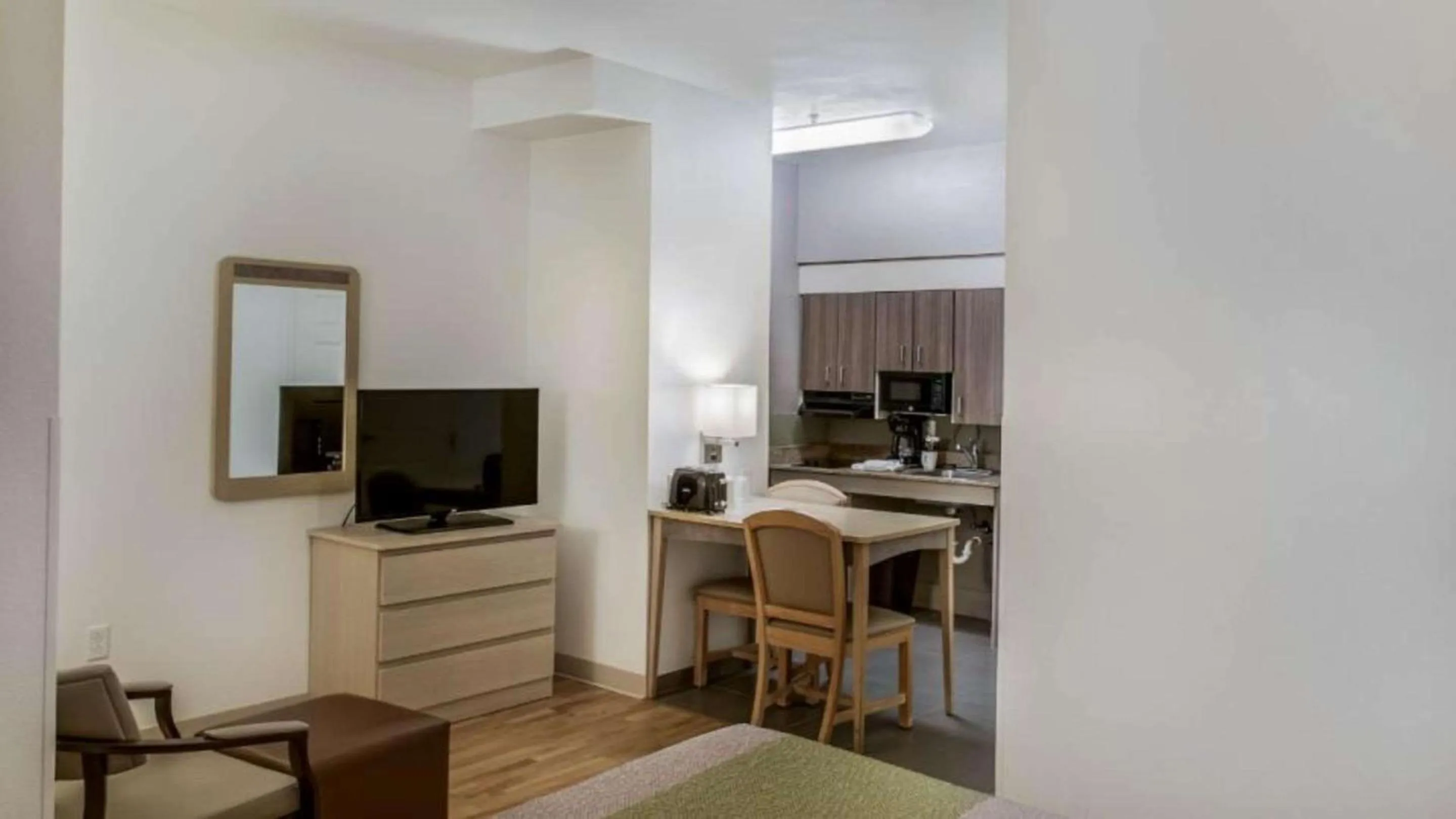 Bedroom in Suburban Studios Fishers Indianapolis