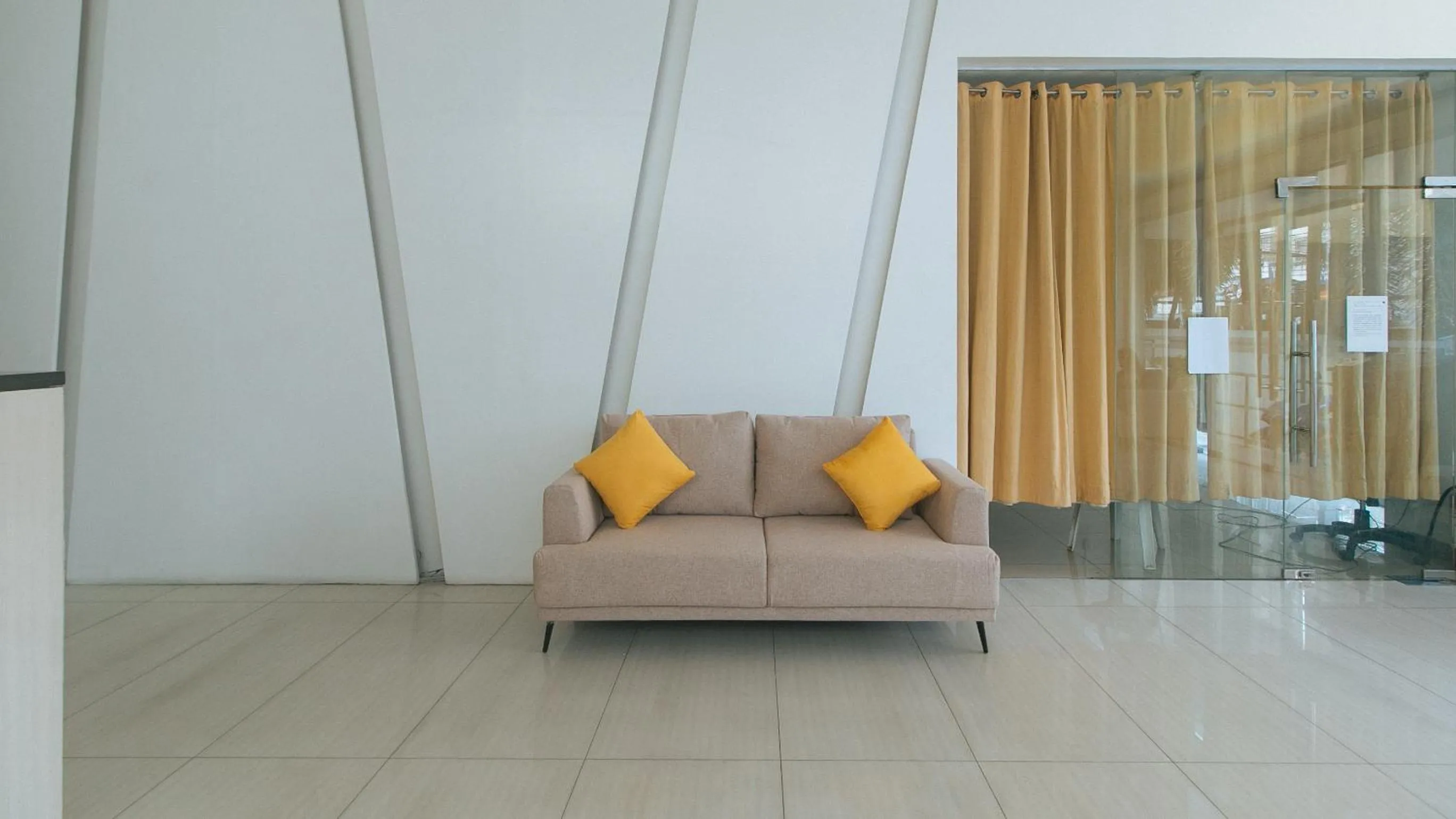 Seating area in RedDoorz at LuxeLite Suites Makati