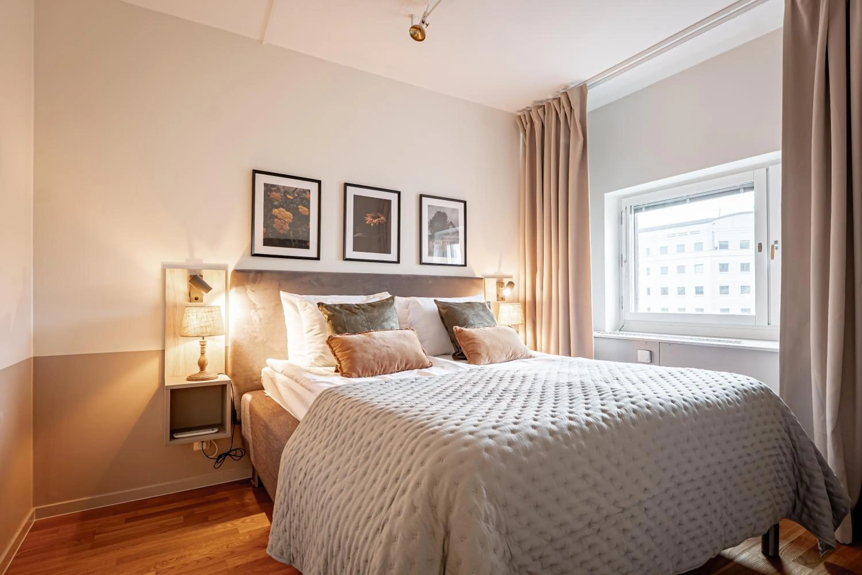 Bed in Injoy Premium Hotel Solna