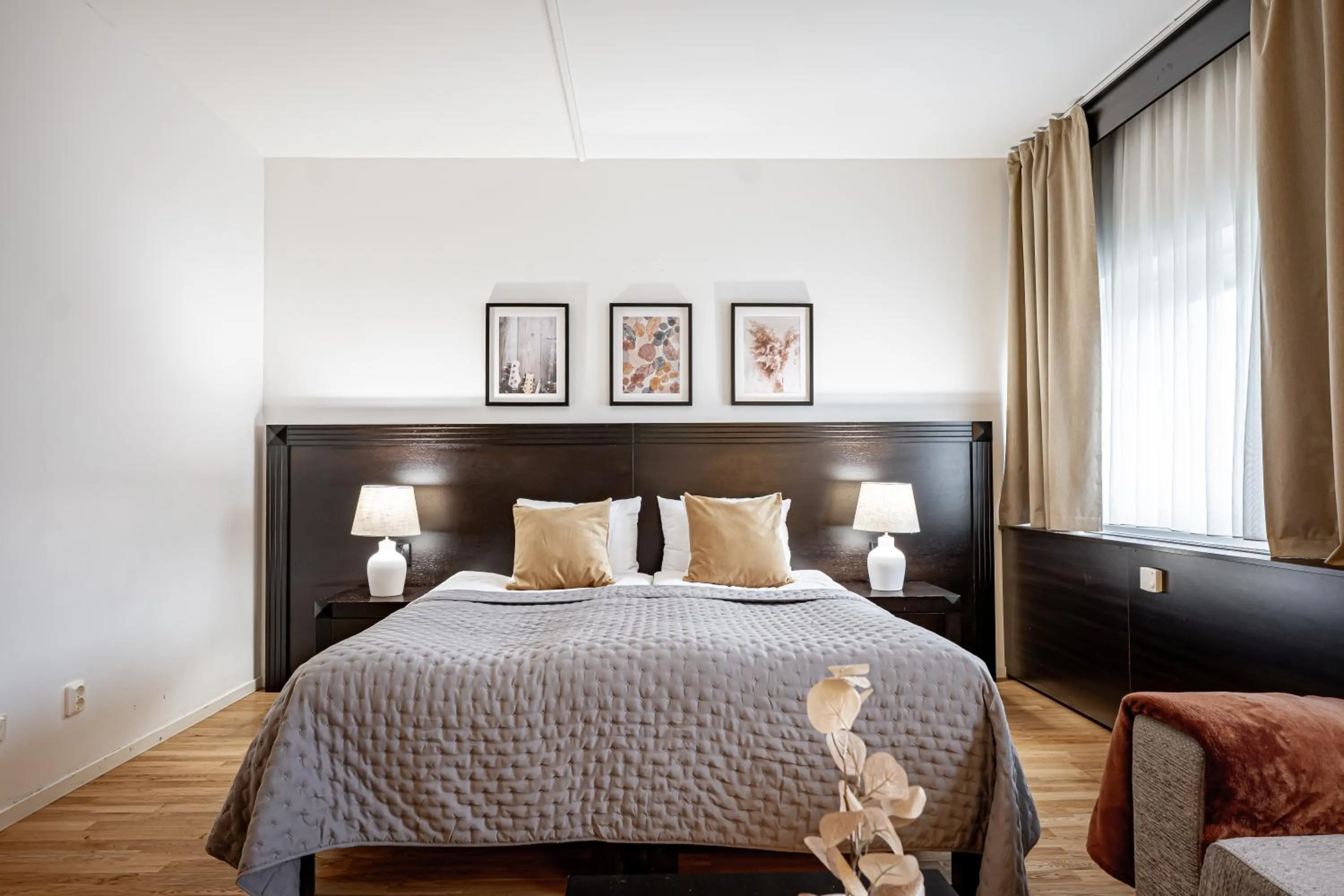 Bed in Injoy Premium Hotel Solna