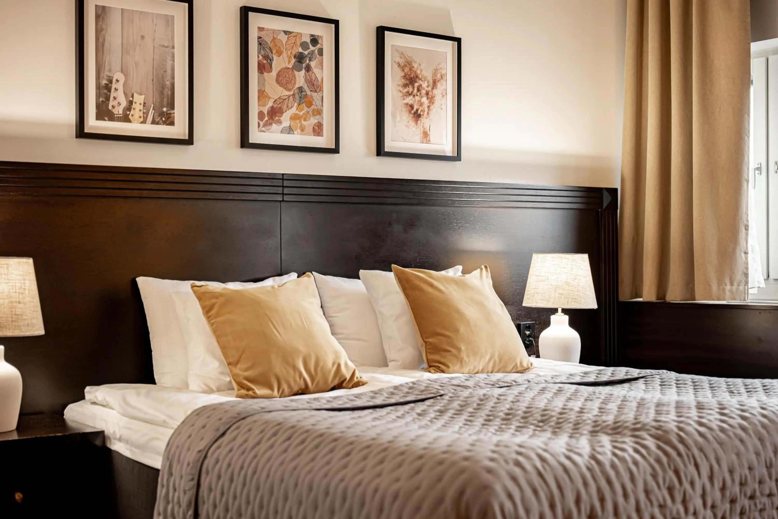 Bed in Injoy Premium Hotel Solna