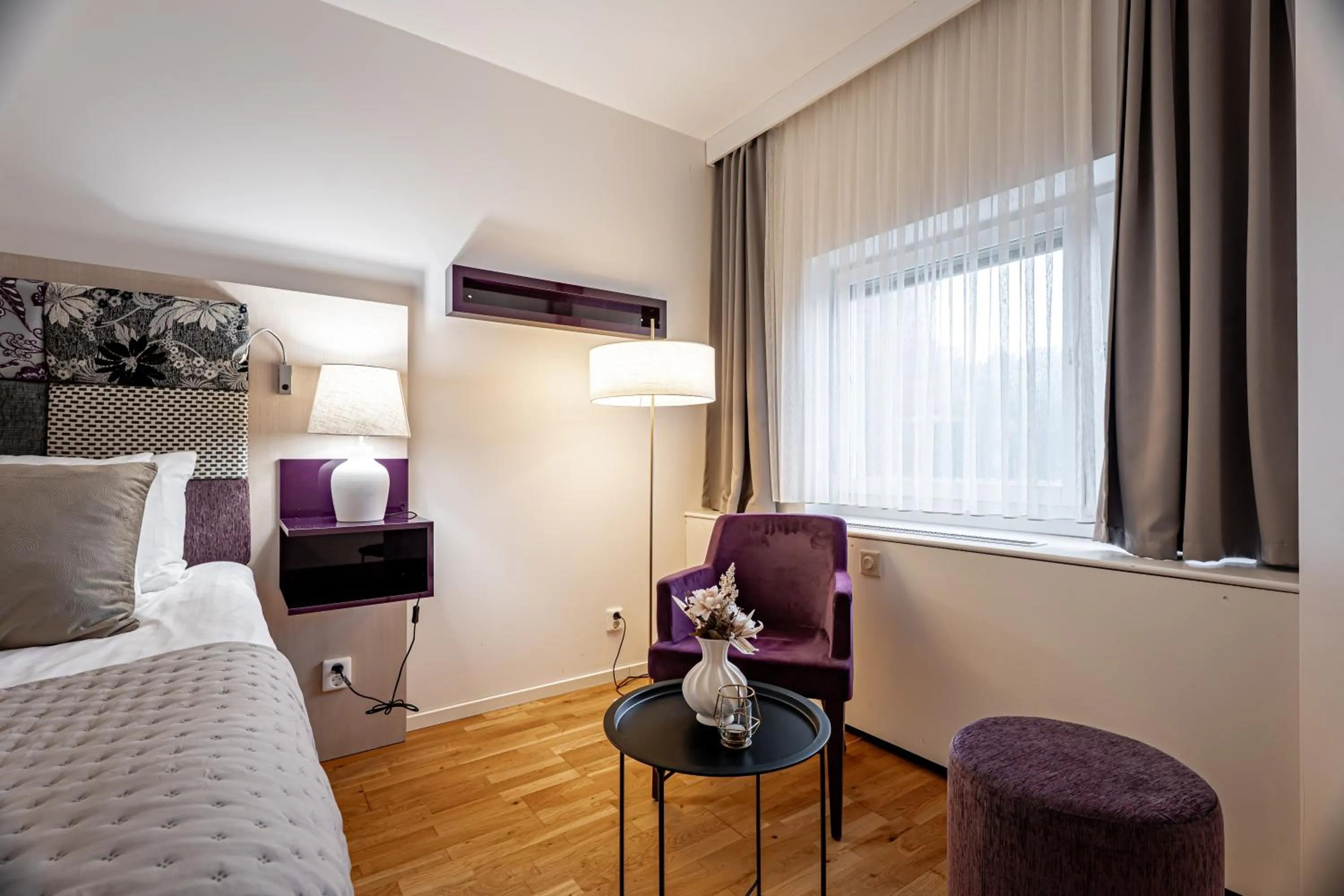 Seating area, Bed in Injoy Premium Hotel Solna