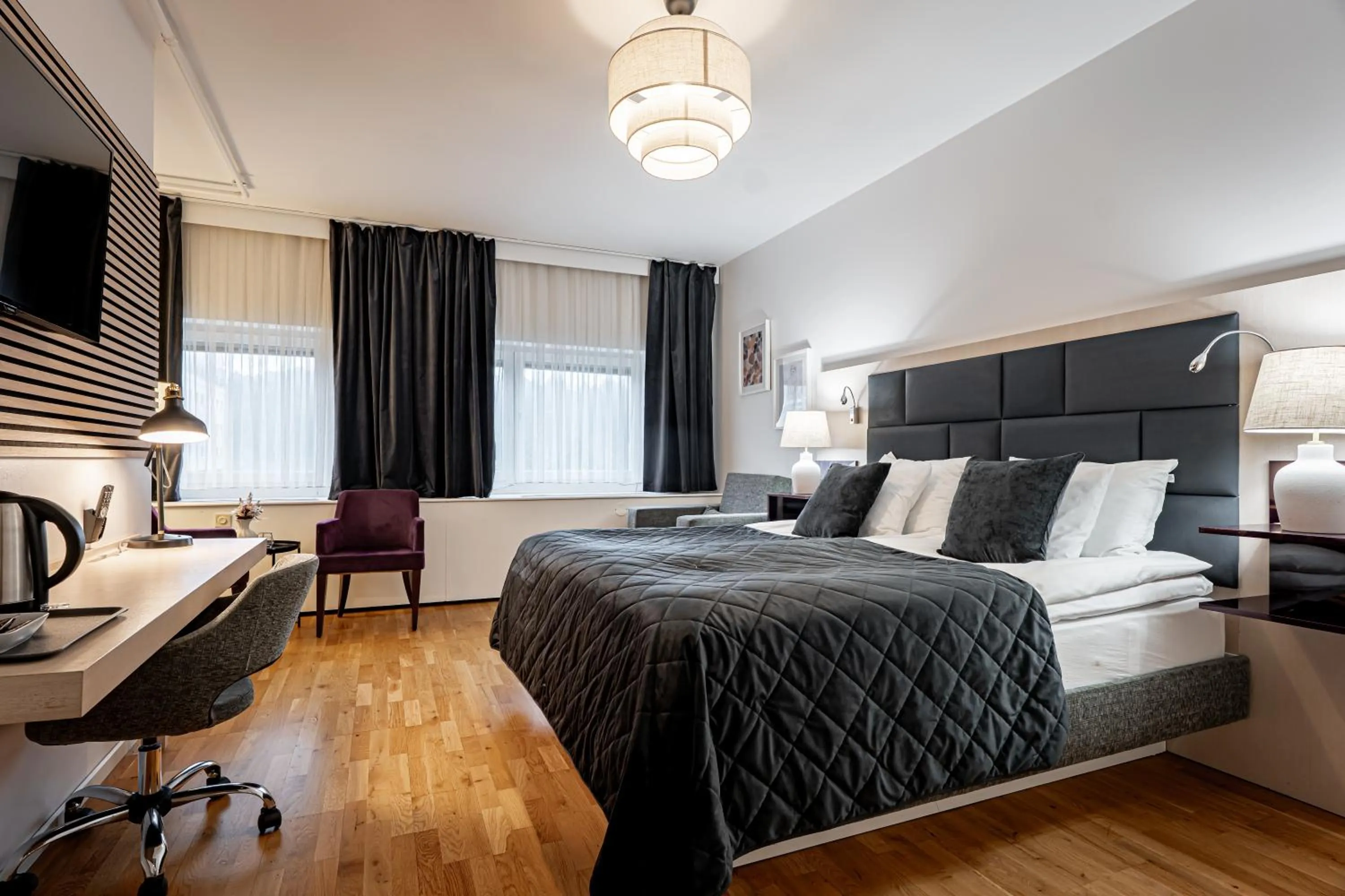 Bed in Injoy Premium Hotel Solna